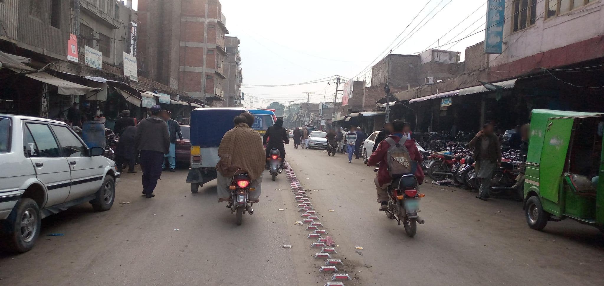 Street view near Jamal Hotel, Peshawar — © RobinGoix (CC BY-SA · Mapillary)