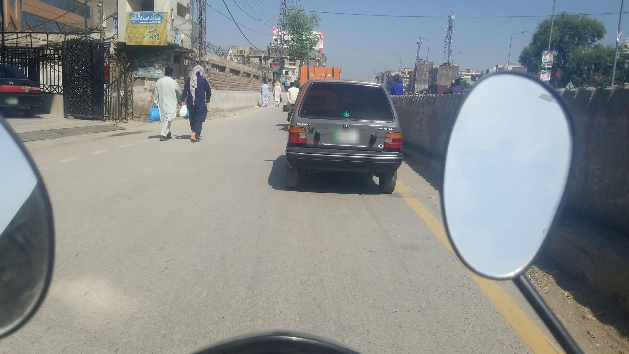 Street view near Ekhwan Inn, Peshawar — © RobinGoix (CC BY-SA · Mapillary)