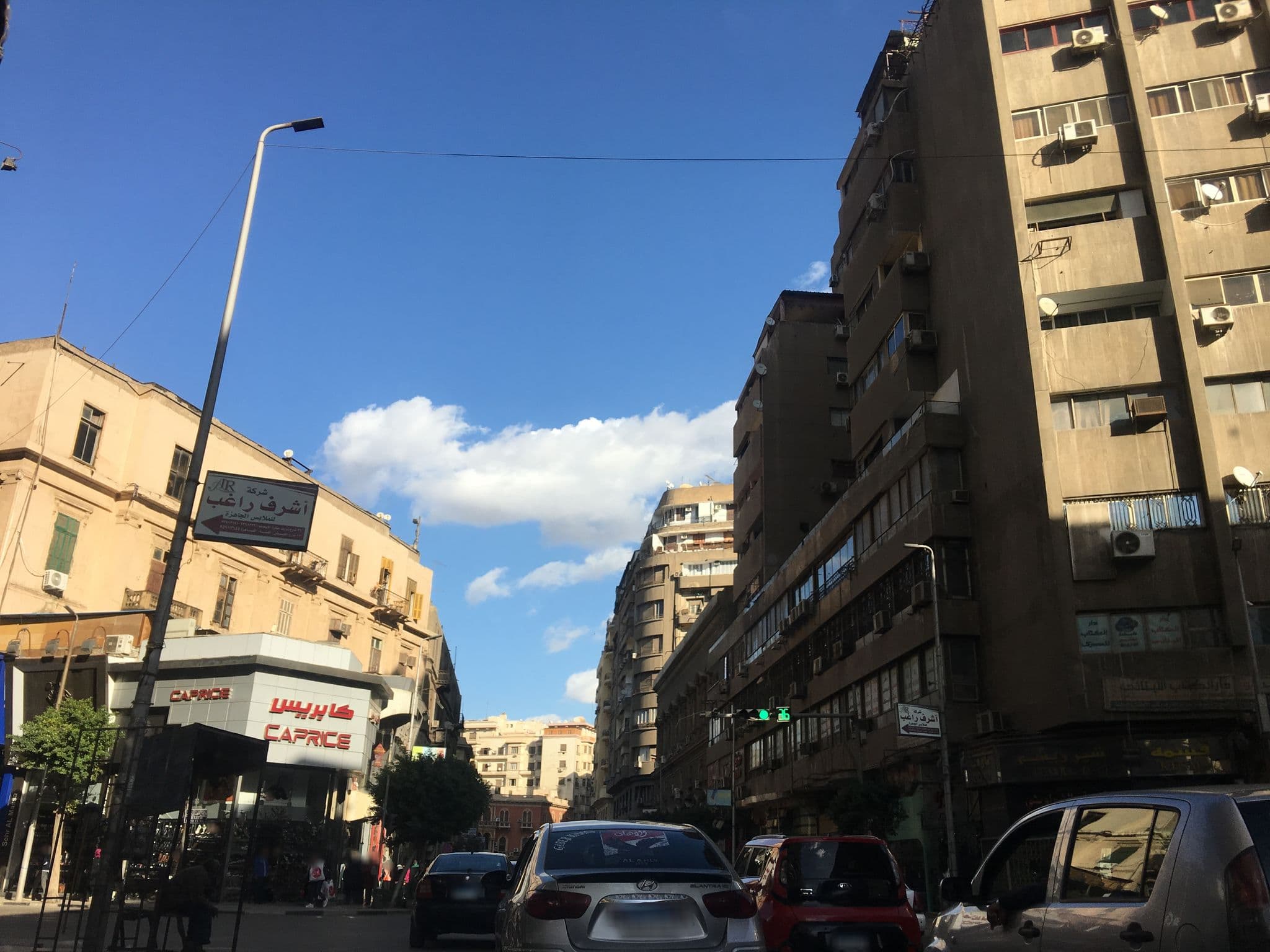 Street view near Outinha.com, Būlāq Abū al ‘Ilā — © myoussef87 (CC BY-SA · Mapillary)