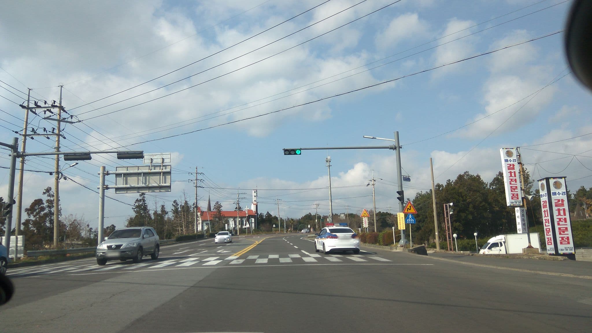 Street view near 꿈에그린팬션, Seogwipo — © eneerhut (CC BY-SA · Mapillary)