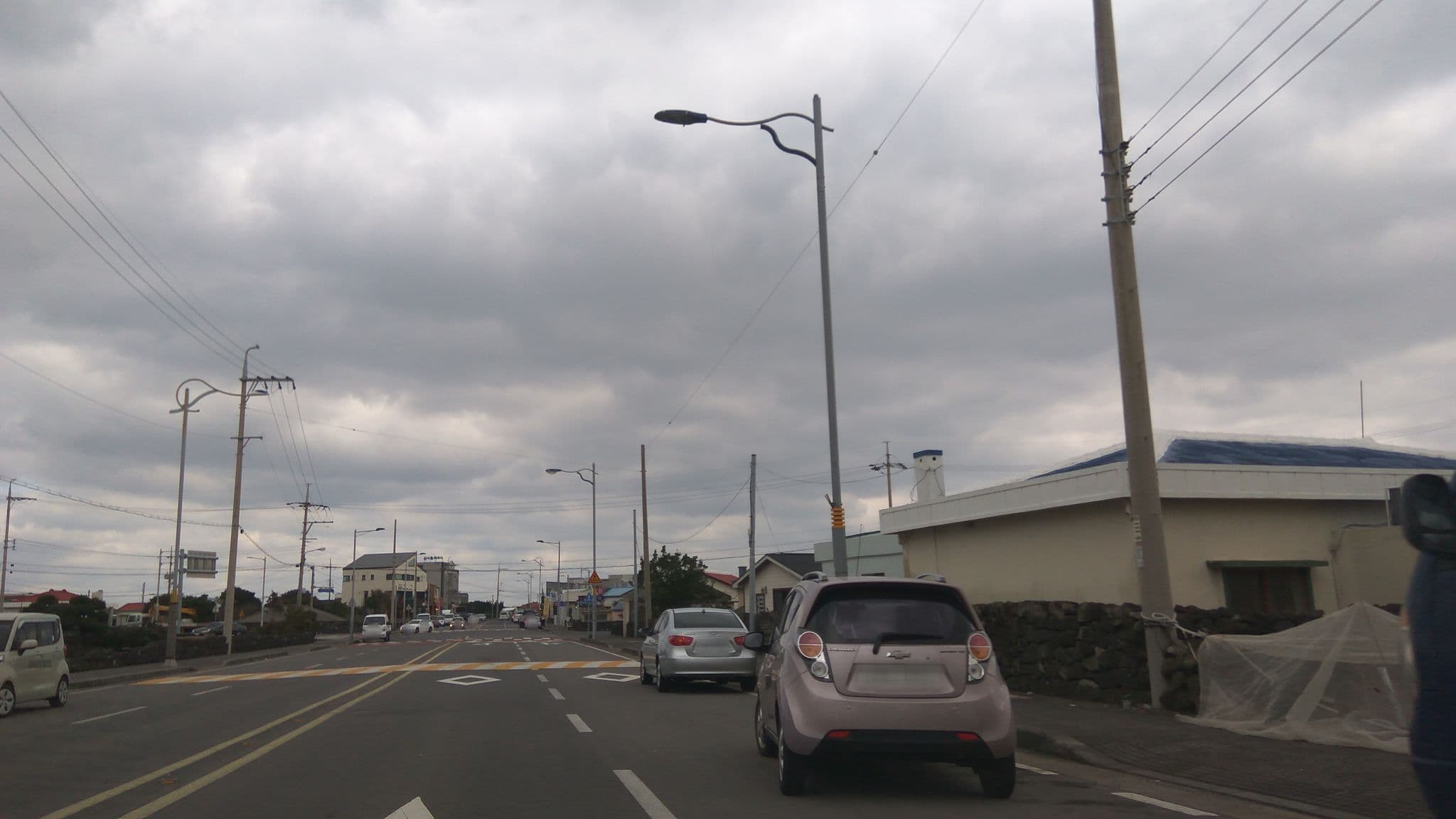 Street view near 썬라이즈호텔 섭지코지점, Ponggae-dong — © eneerhut (CC BY-SA · Mapillary)
