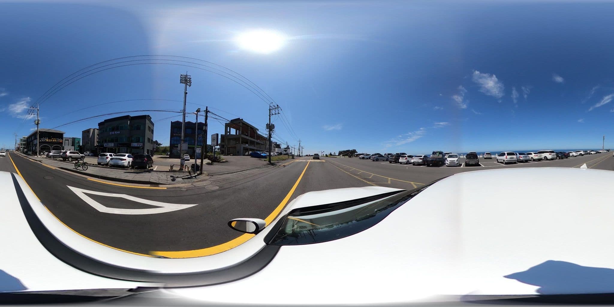 Street view near 진비치하우스, Jeju City — © eneerhut (CC BY-SA · Mapillary)
