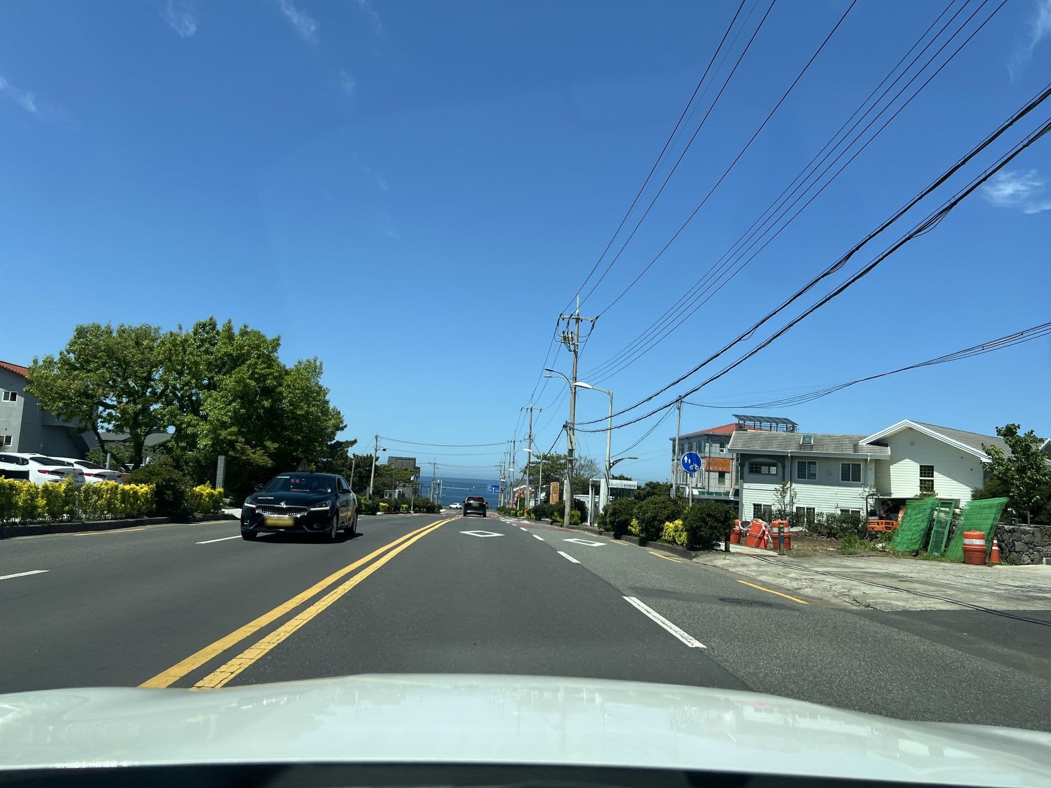 Street view near 코스트웨이, Jeju City — © eneerhut (CC BY-SA · Mapillary)