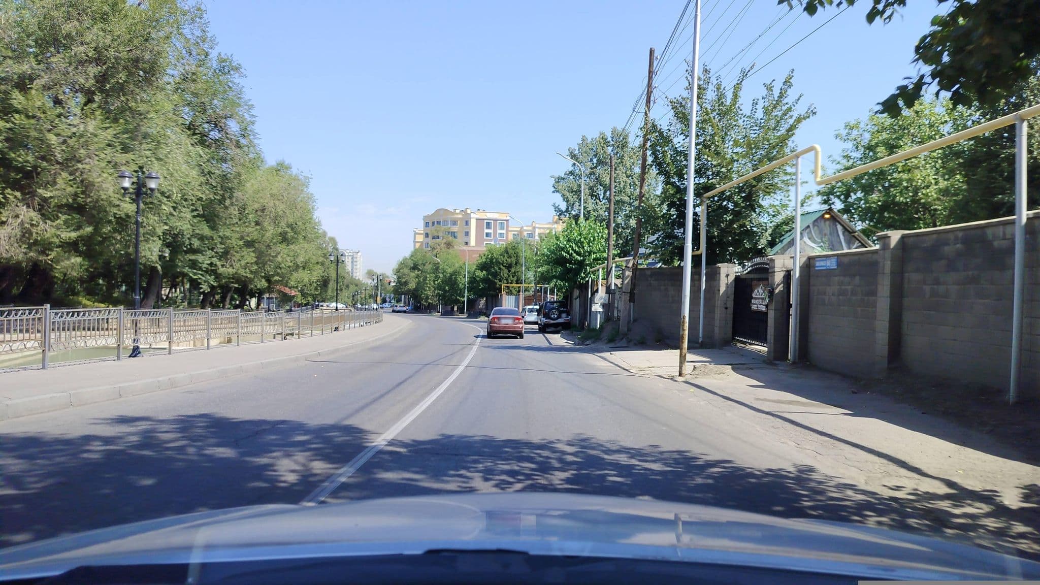 Street view near Wanderlust Hostel Riverside, Almaty — © sevenmp (CC BY-SA · Mapillary)