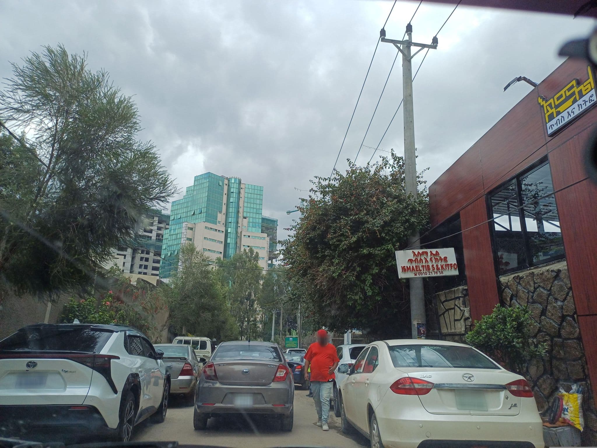 Street view near Olympia Guesthouse, Addis Ababa — © Agraw (CC BY-SA · Mapillary)