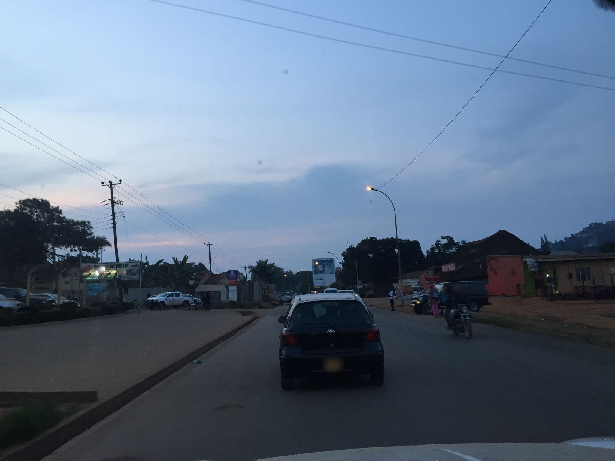 Street view near Jolly Court Hotel, Kampala — © mga (CC BY-SA · Mapillary)