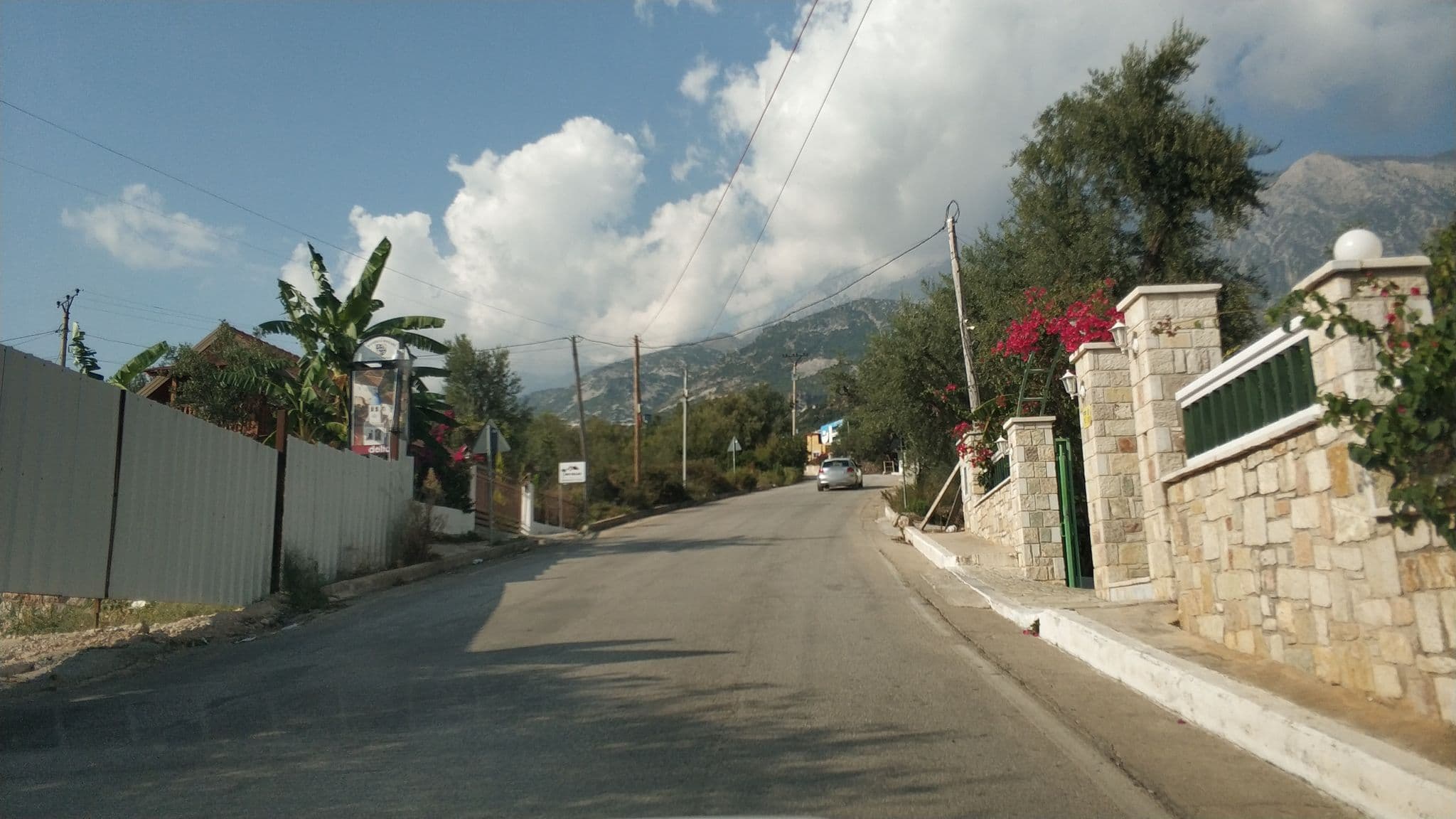 Street view near Augustus, Dhërmi — © freddouhelk (CC BY-SA · Mapillary)