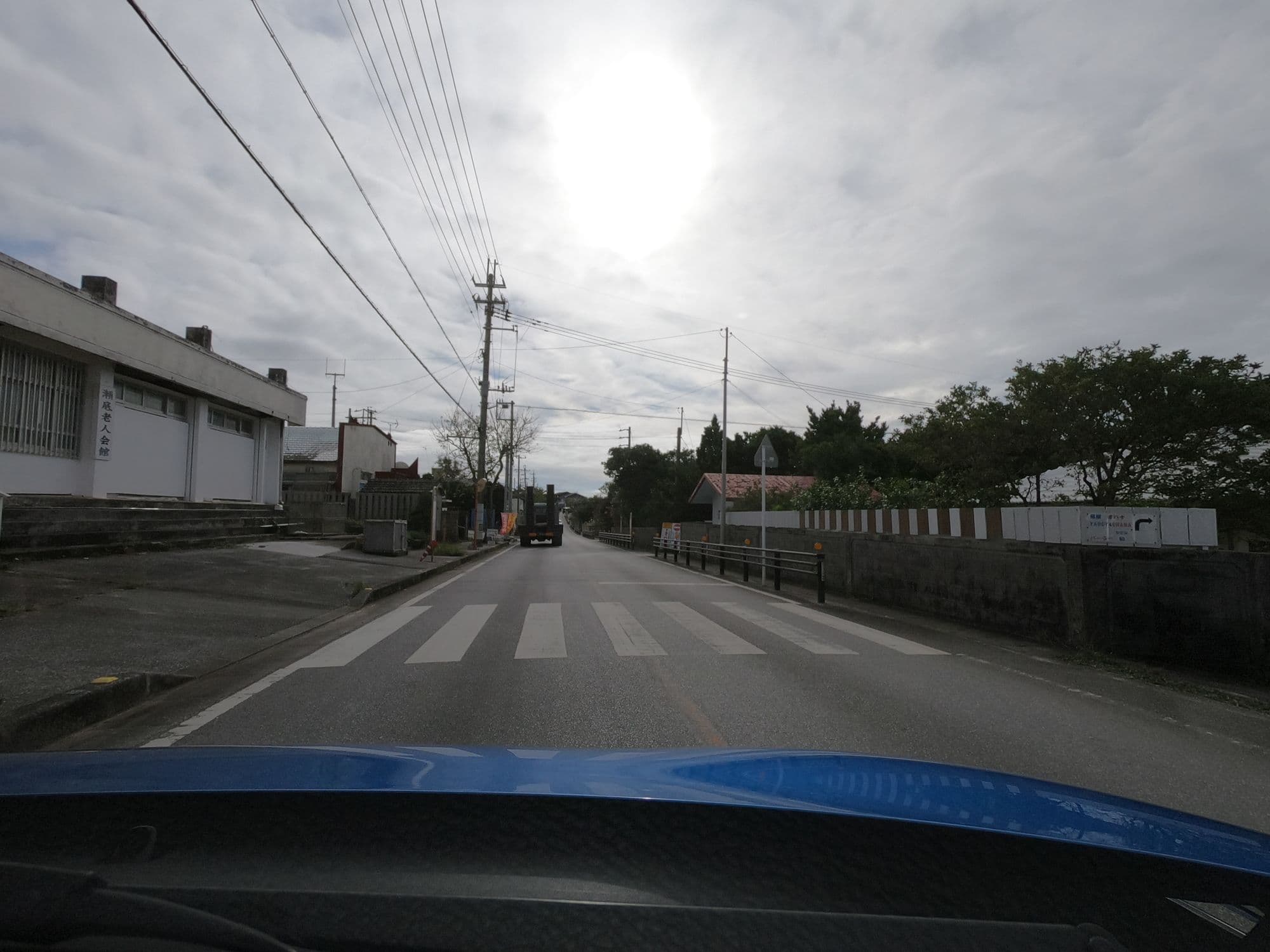 Street view near 宿屋オハナ, Motobu — © 24dakenlo (CC BY-SA · Mapillary)