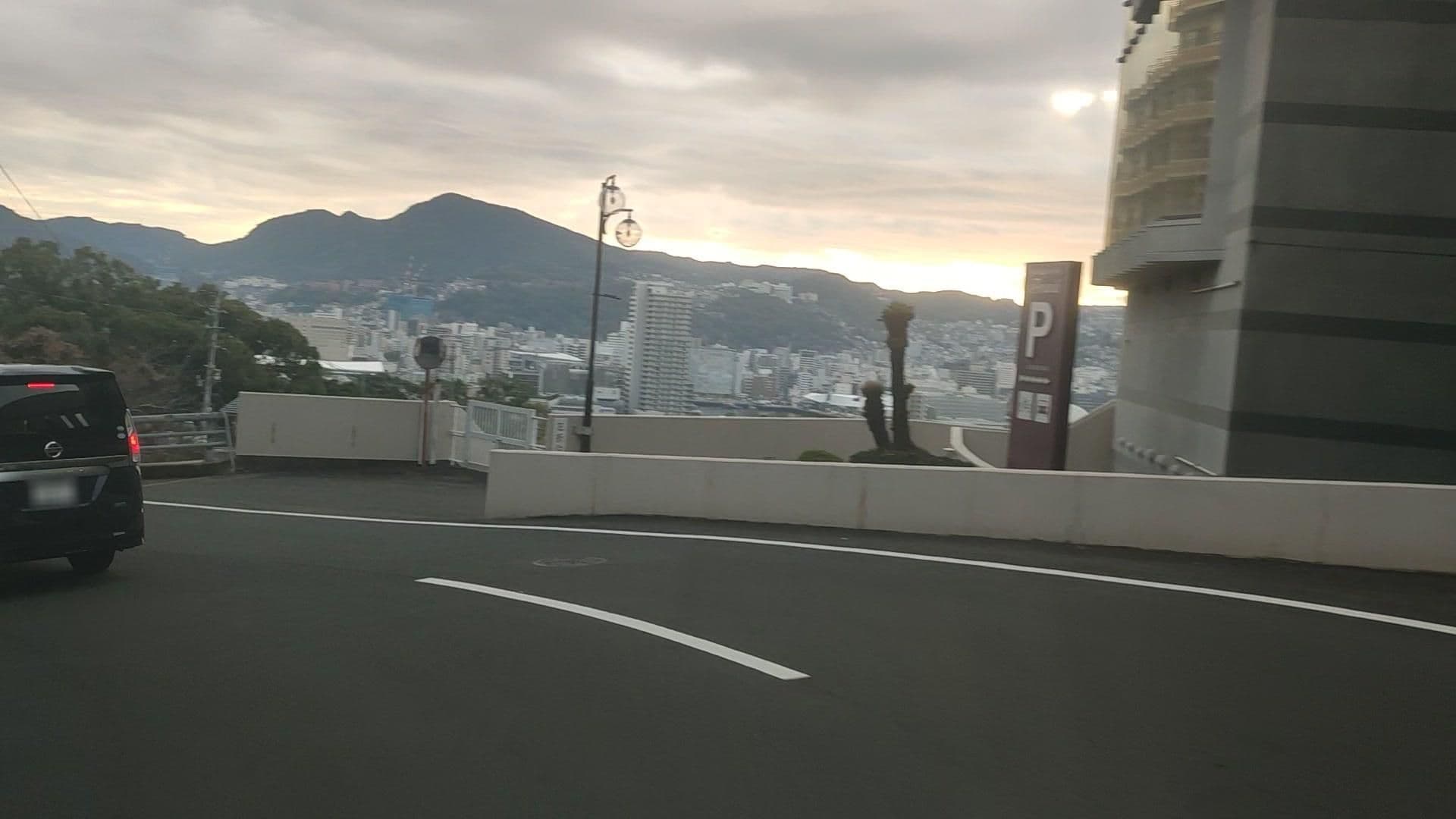 Street view near 稲佐山温泉 ホテルアマンディ, Nagasaki — © drivephotograph (CC BY-SA · Mapillary)