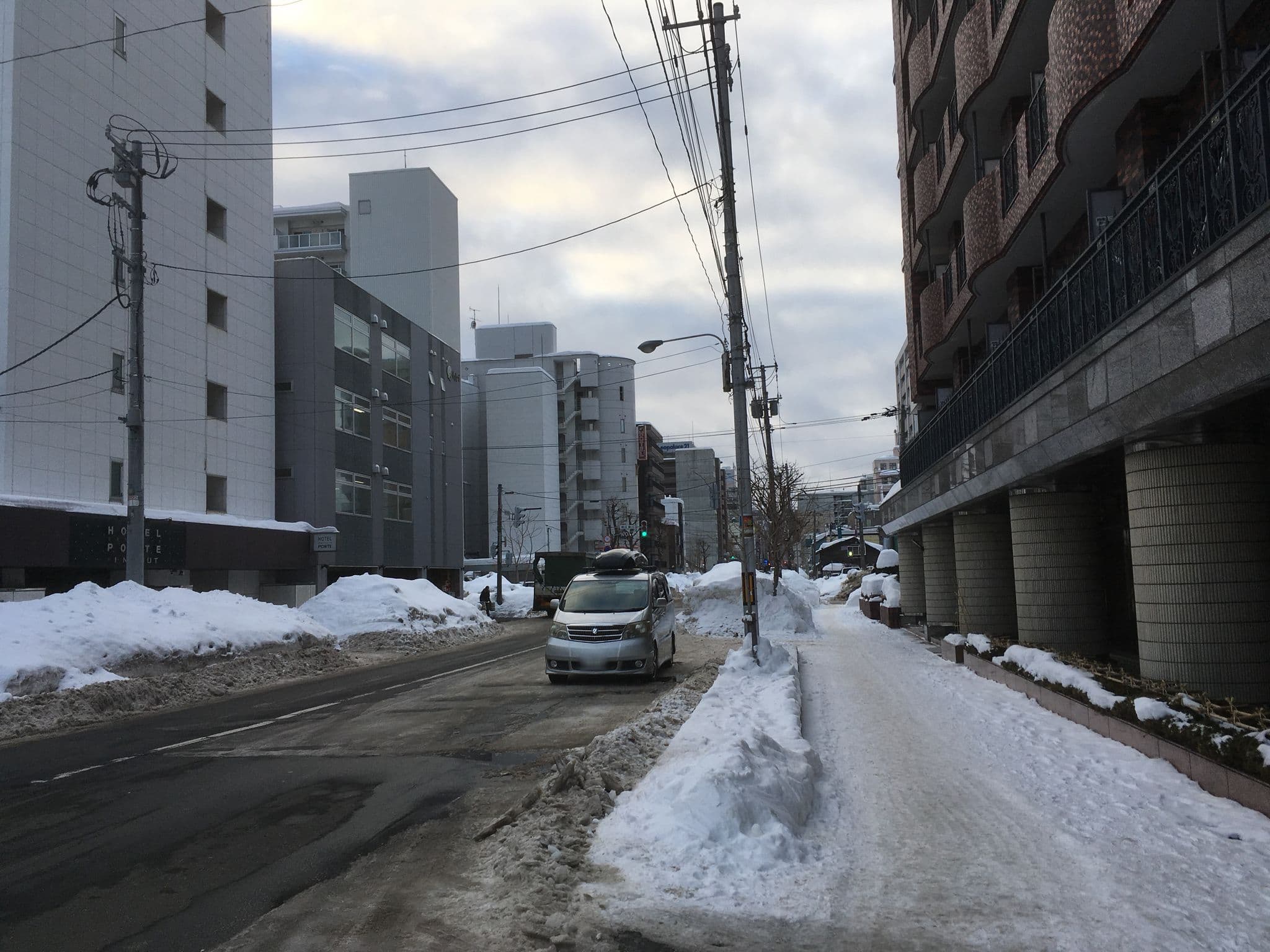 Street view near ホテルポルテ, Sapporo — © chrisbeddow (CC BY-SA · Mapillary)