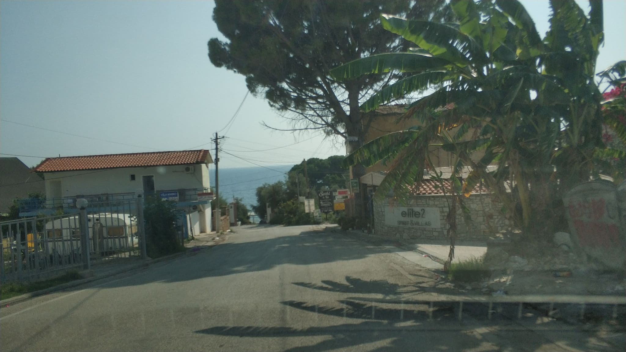 Street view near Hotel Nino, Dhërmi — © freddouhelk (CC BY-SA · Mapillary)