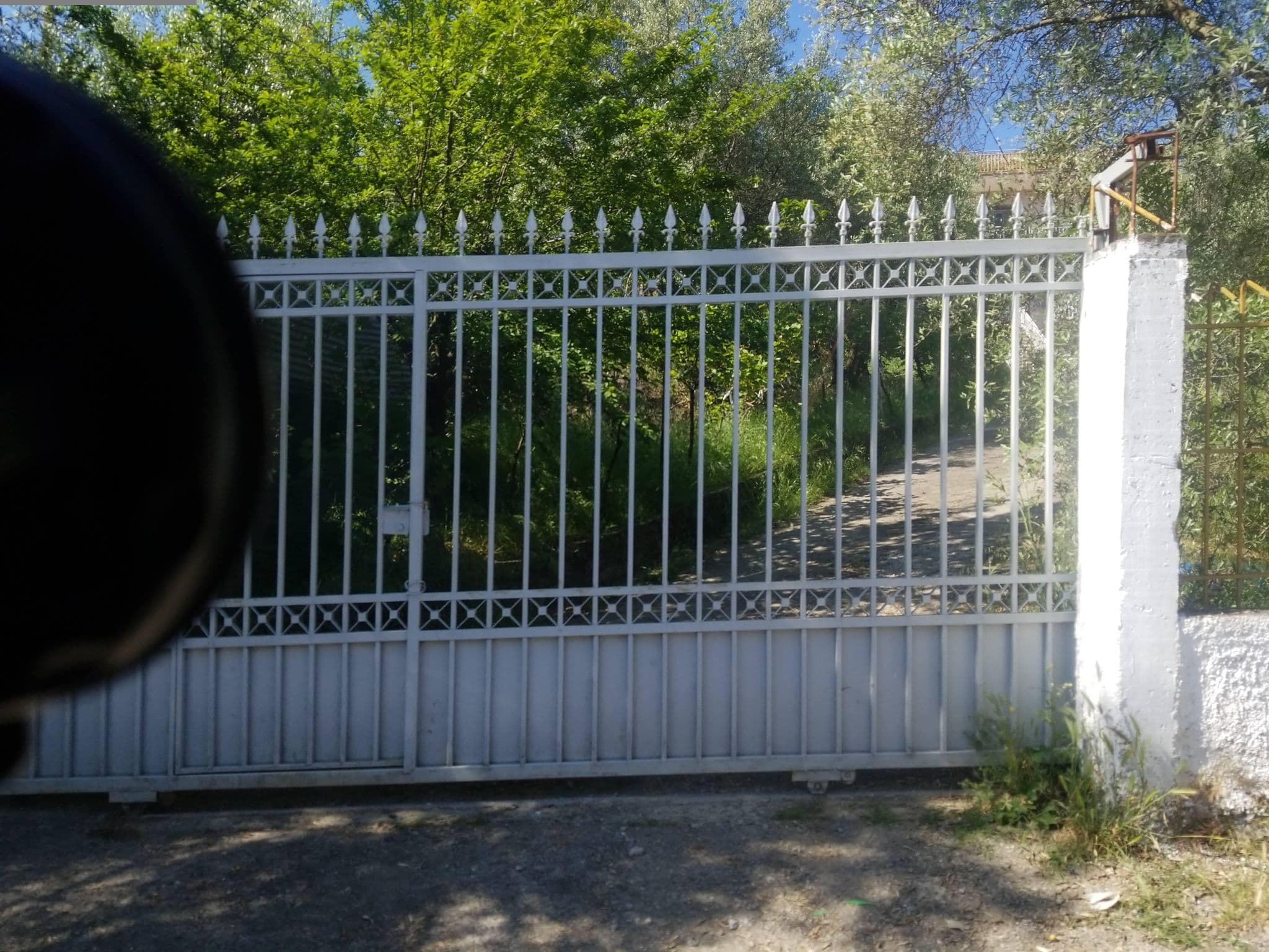 Street view near Olivar Hotel Tirana, Tirana — © denisju_osm (CC BY-SA · Mapillary)
