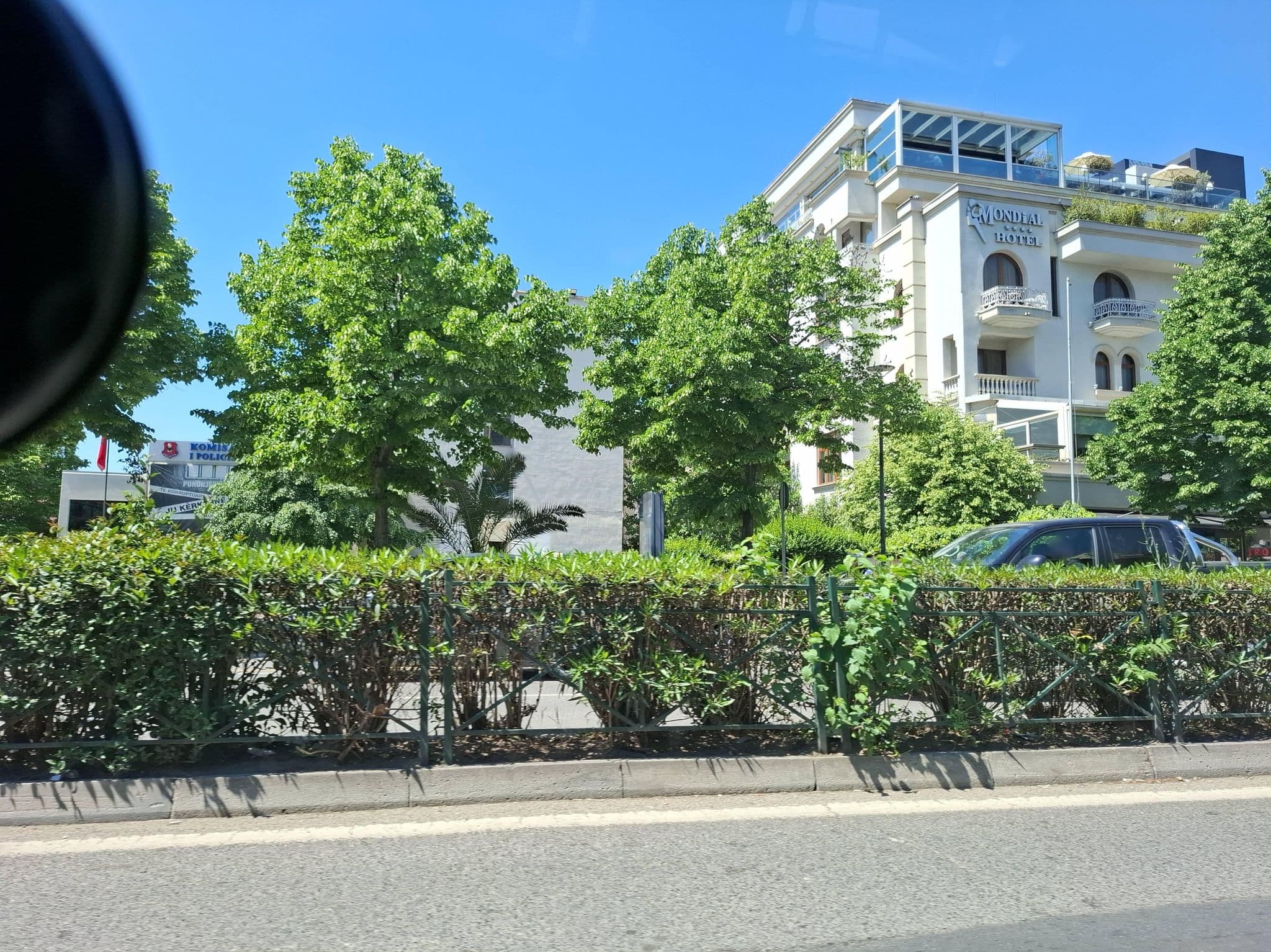 Street view near Mondial Hotel Tirana, Tirana — © denisju_osm (CC BY-SA · Mapillary)