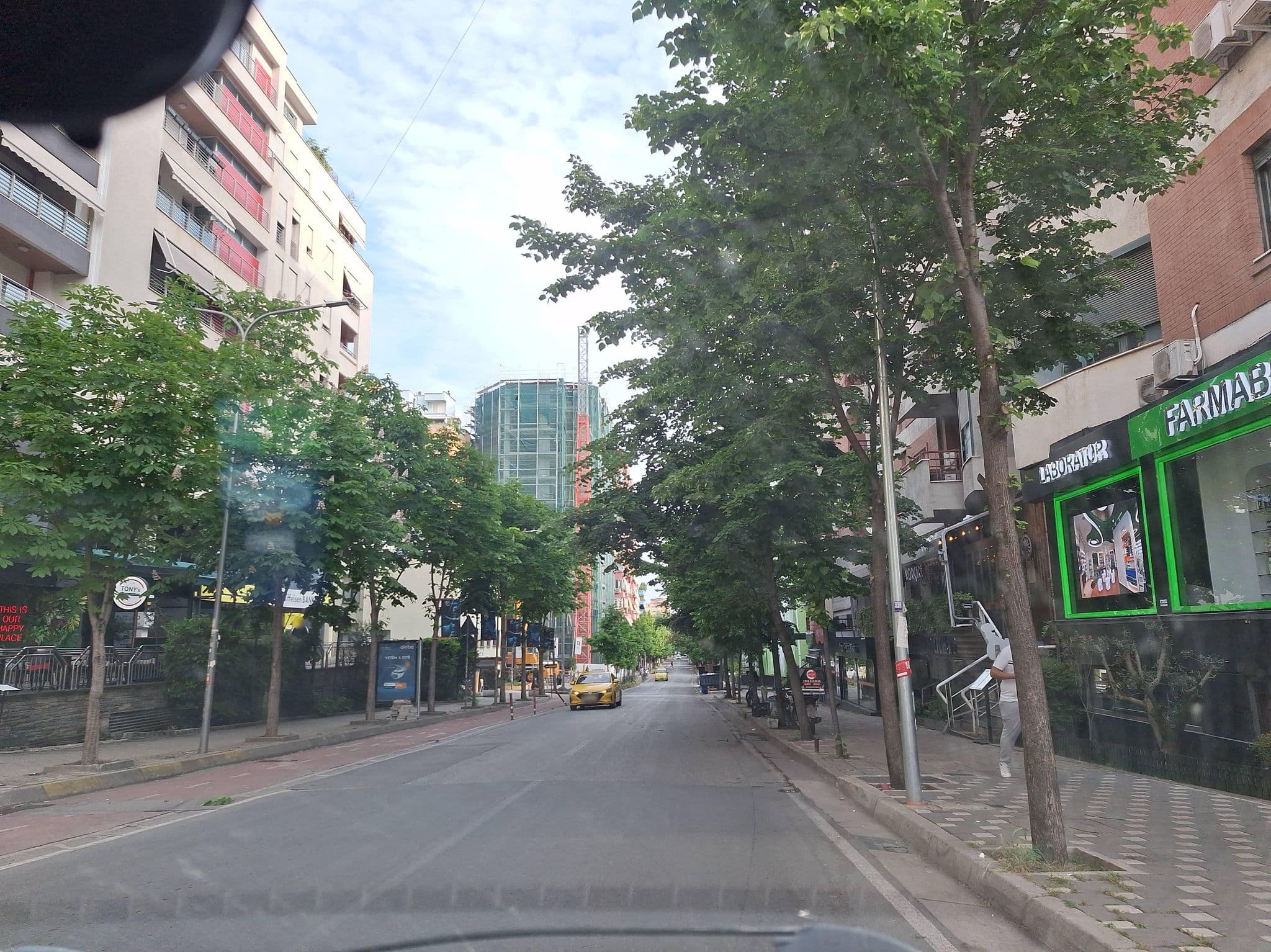 Street view near The Rooms Hotel, Tirana — © denisju_osm (CC BY-SA · Mapillary)