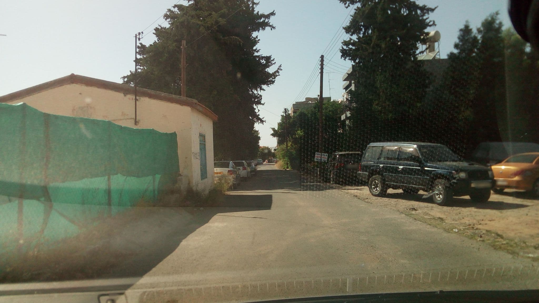 Street view near Vangelos Apartments, Paphos — © stpkyriakou (CC BY-SA · Mapillary)