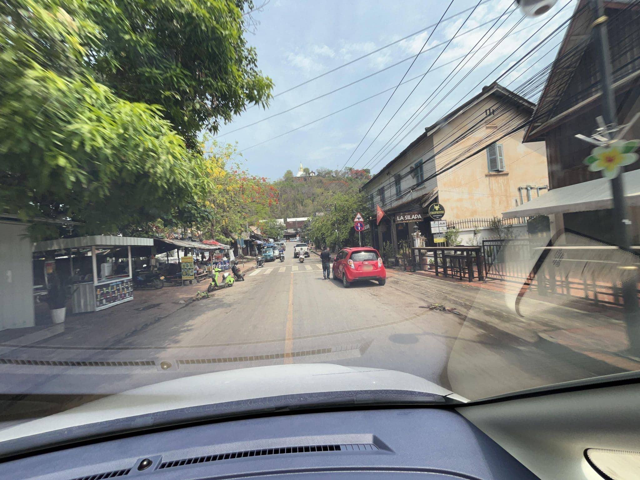 Street view near IQ Inn & Restaurant, Luang Prabang — © naokiosaka (CC BY-SA · Mapillary)