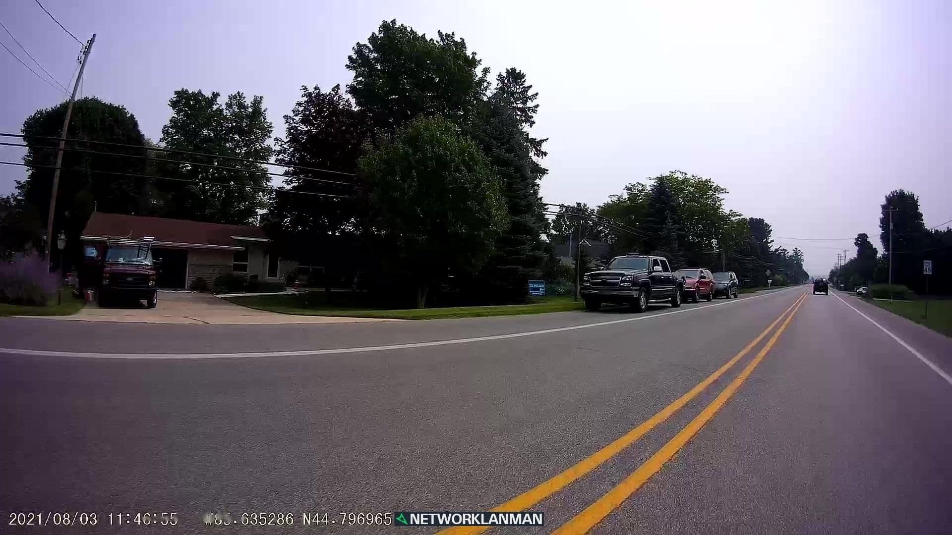 Street view near Bay Blue Cottage, Greilickville — © networklanman (CC BY-SA · Mapillary)
