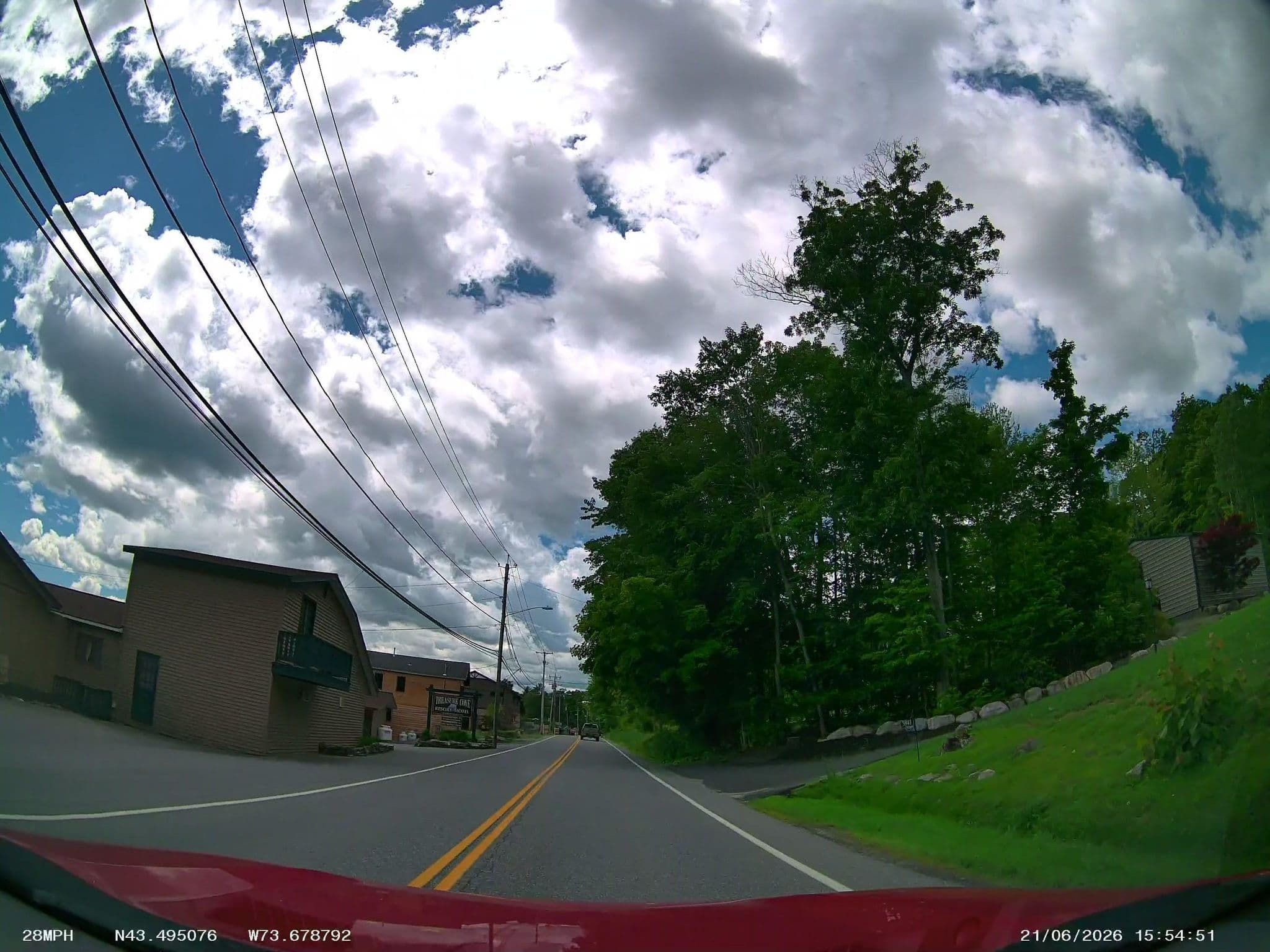 Street view near Treasure Cove Resort Motel and Cottages, Queensbury — © DrivingRoundTown (CC BY-SA · Mapillary)