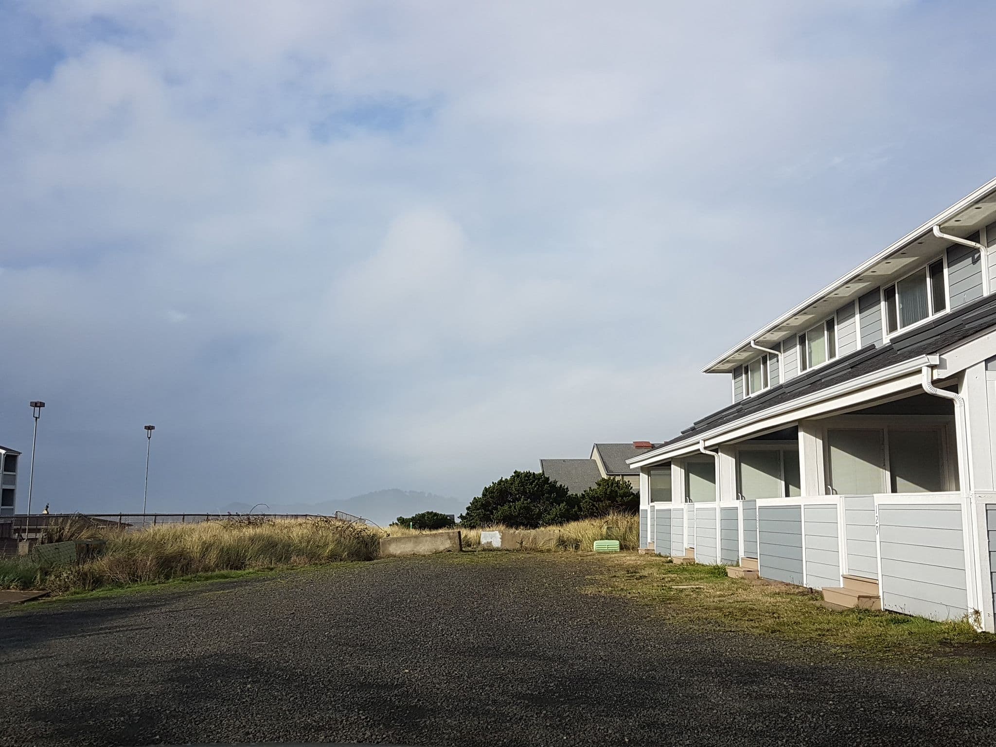 Street view near Nye Beach Townhomes, Agate Beach — © jopparn (CC BY-SA · Mapillary)
