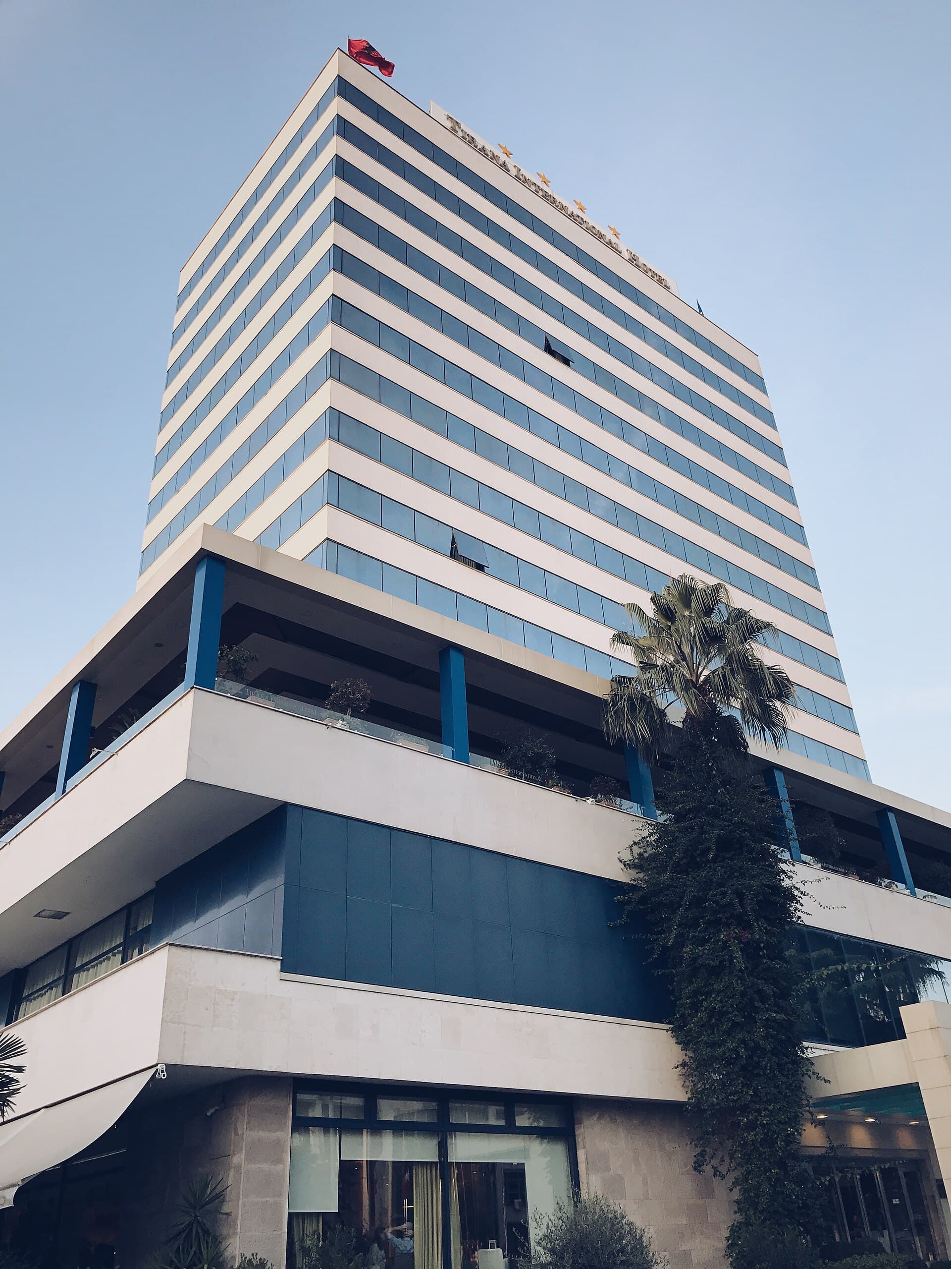 Tirana International Hotel & Conference Centre (via Wikimedia Commons, CC BY-SA 4.0)