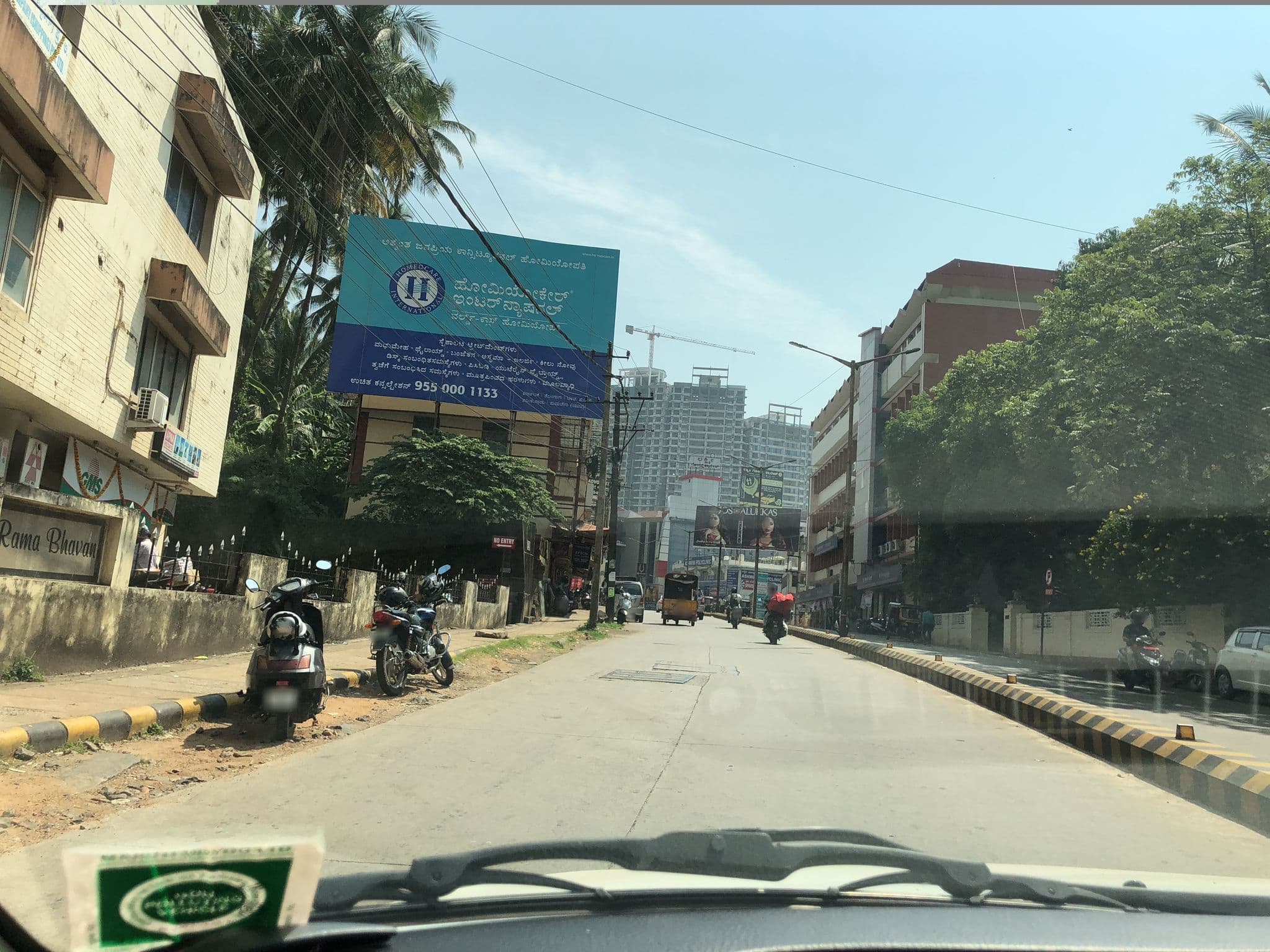 Street view near Poonj International, Mangaluru — © krshibu (CC BY-SA · Mapillary)