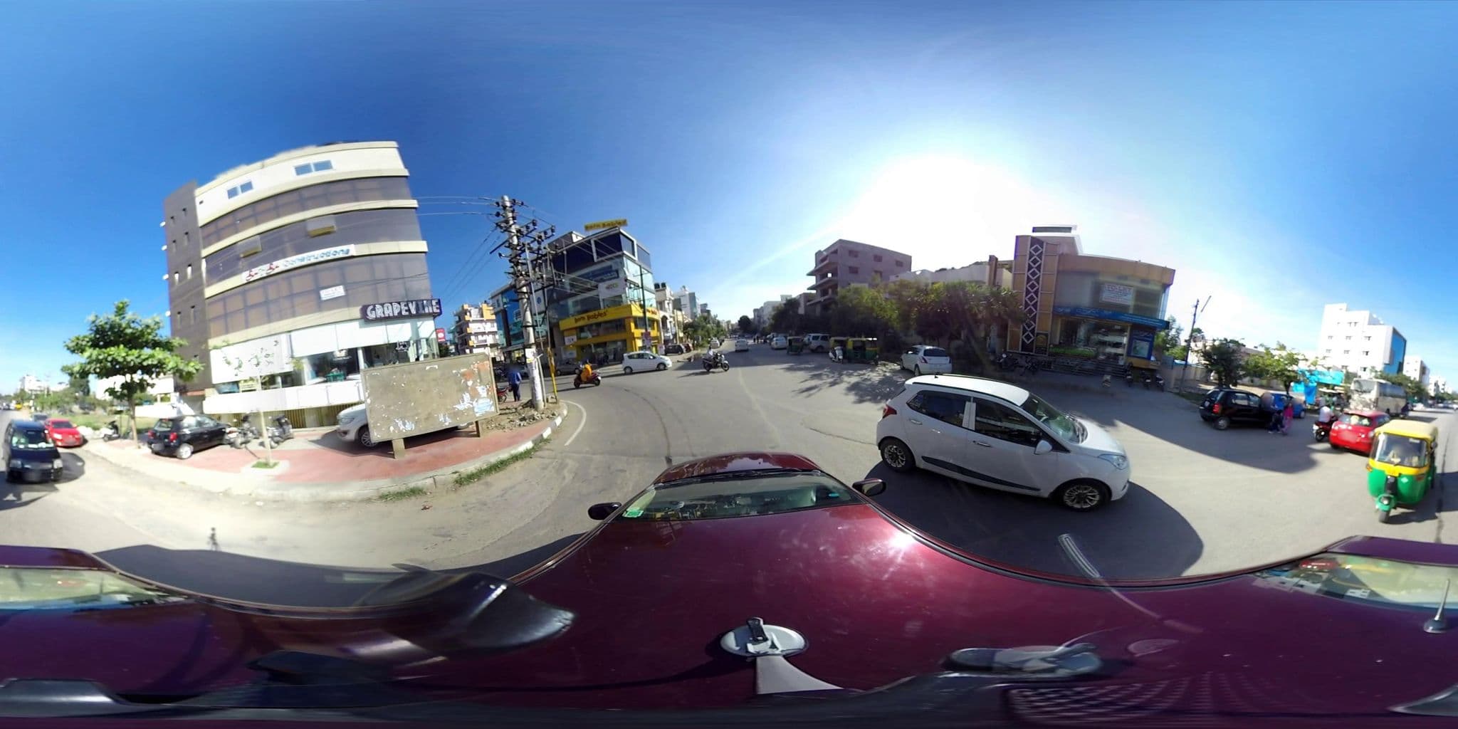 Street view near Mini Thai, Electronic City Phase I — © xplorazzi (CC BY-SA · Mapillary)