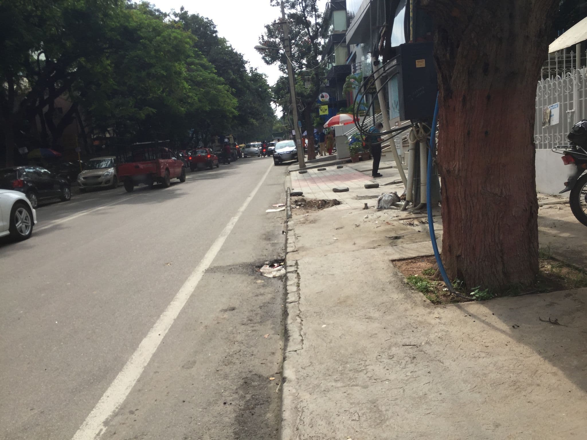 Street view near 12Th Avenue Hotel Bangalore, Bengaluru — © planemad (CC BY-SA · Mapillary)