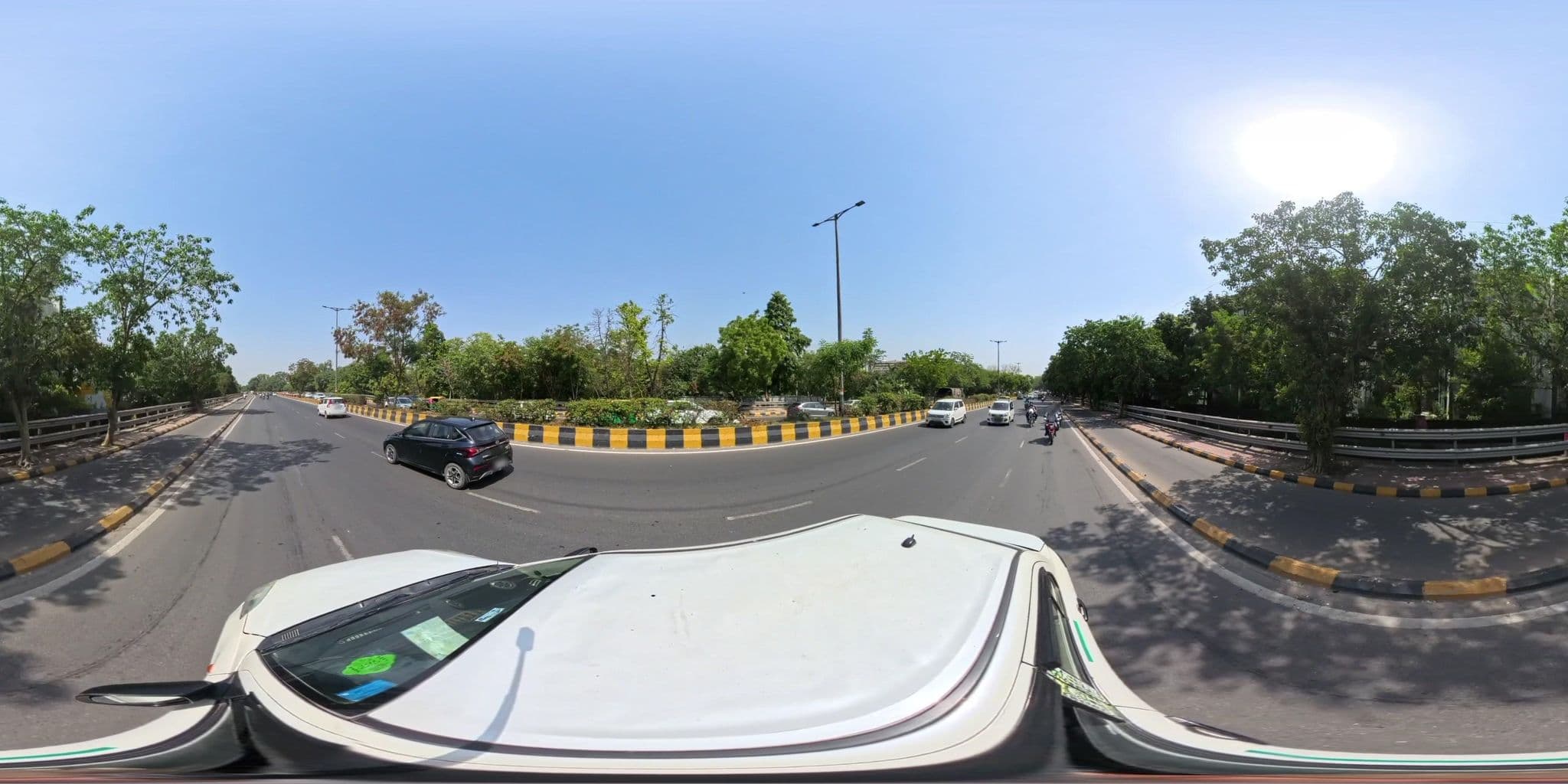 Street view near T Home, New Delhi — © skysign (CC BY-SA · Mapillary)