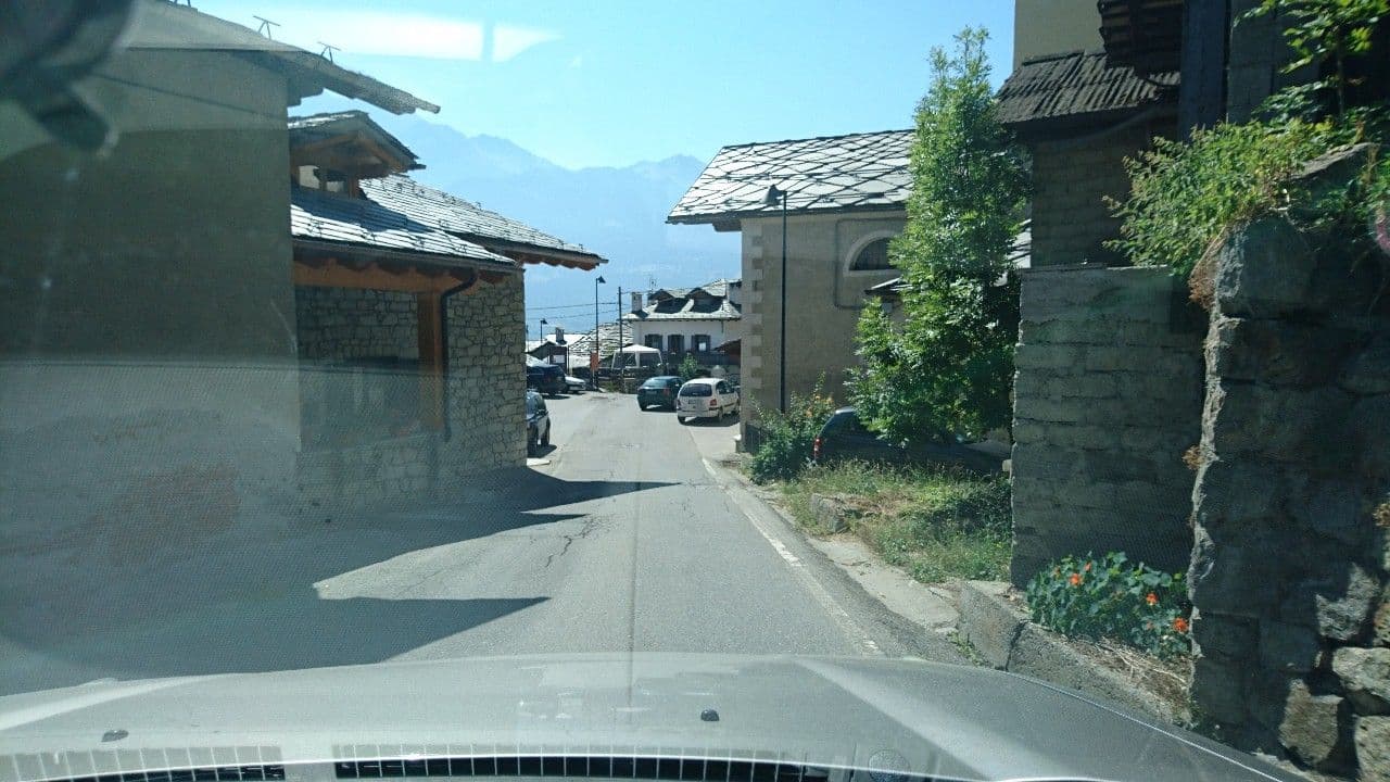 Street view near Le Foyer de la Ferme, Aosta — © voschix (CC BY-SA · Mapillary)