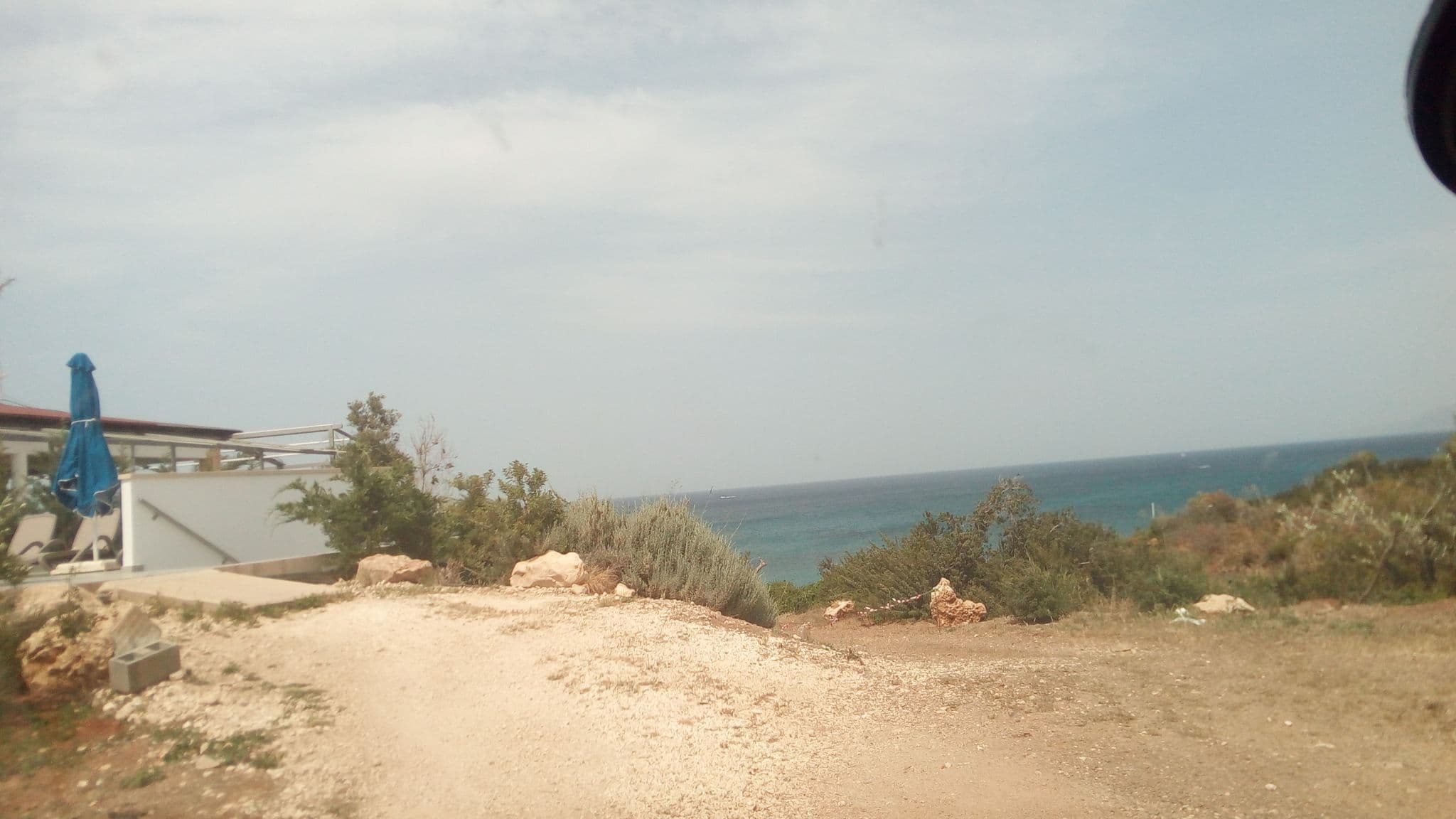 Street view near Aphrodite Beach, Pólis — © stpkyriakou (CC BY-SA · Mapillary)