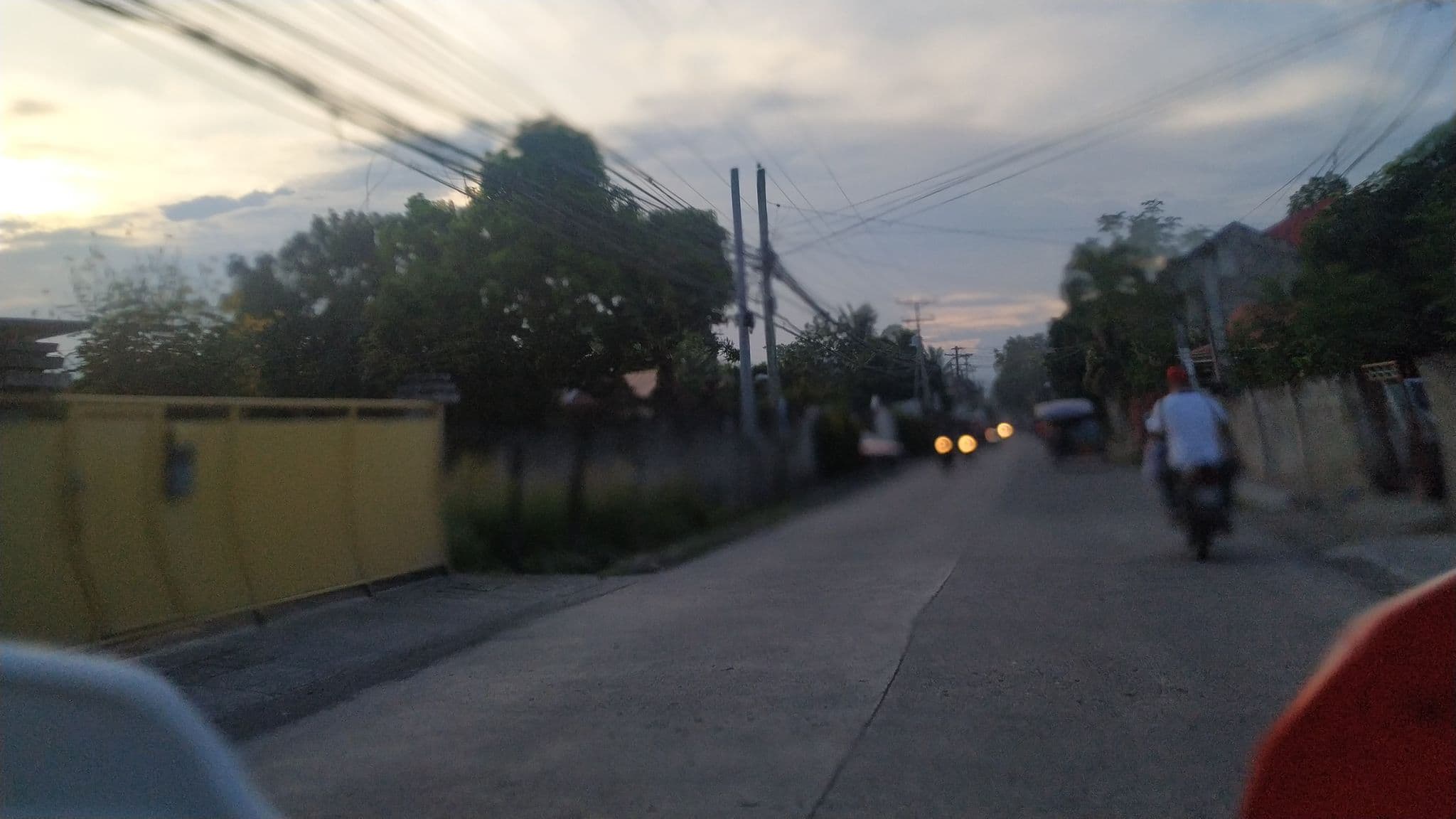 Street view near Sam's Bed & Breakfast, Dumaguete — © justtobedrew (CC BY-SA · Mapillary)