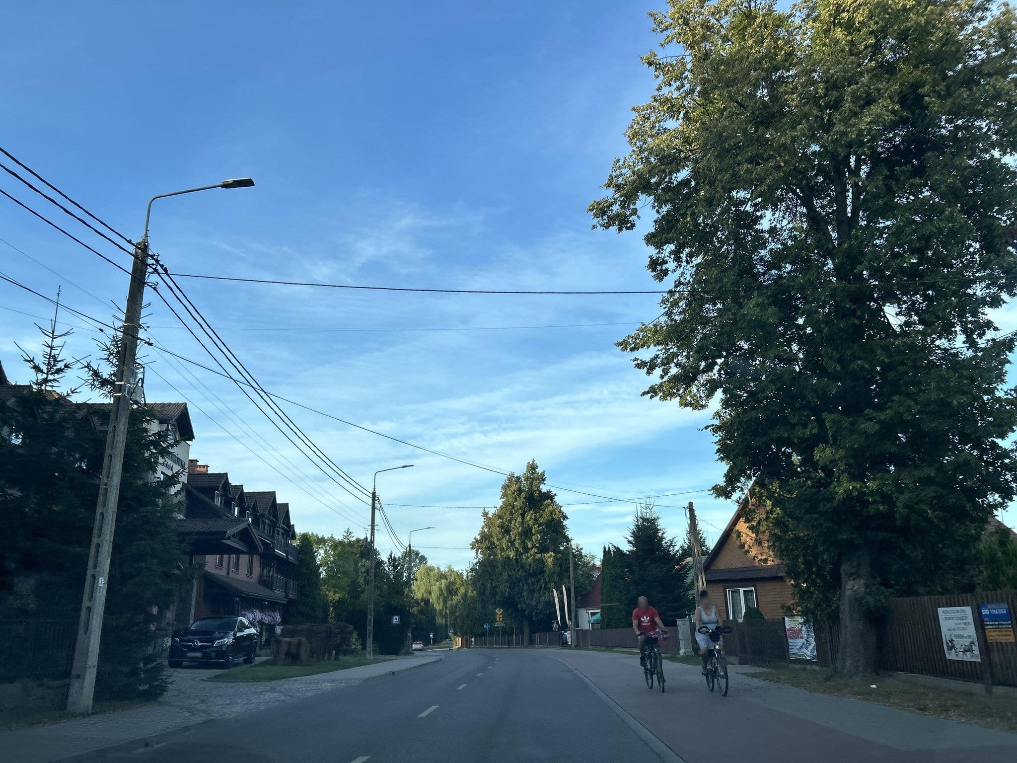 Street view near Hotel Zubrowka Best Western, Białowieża — © strudel (CC BY-SA · Mapillary)