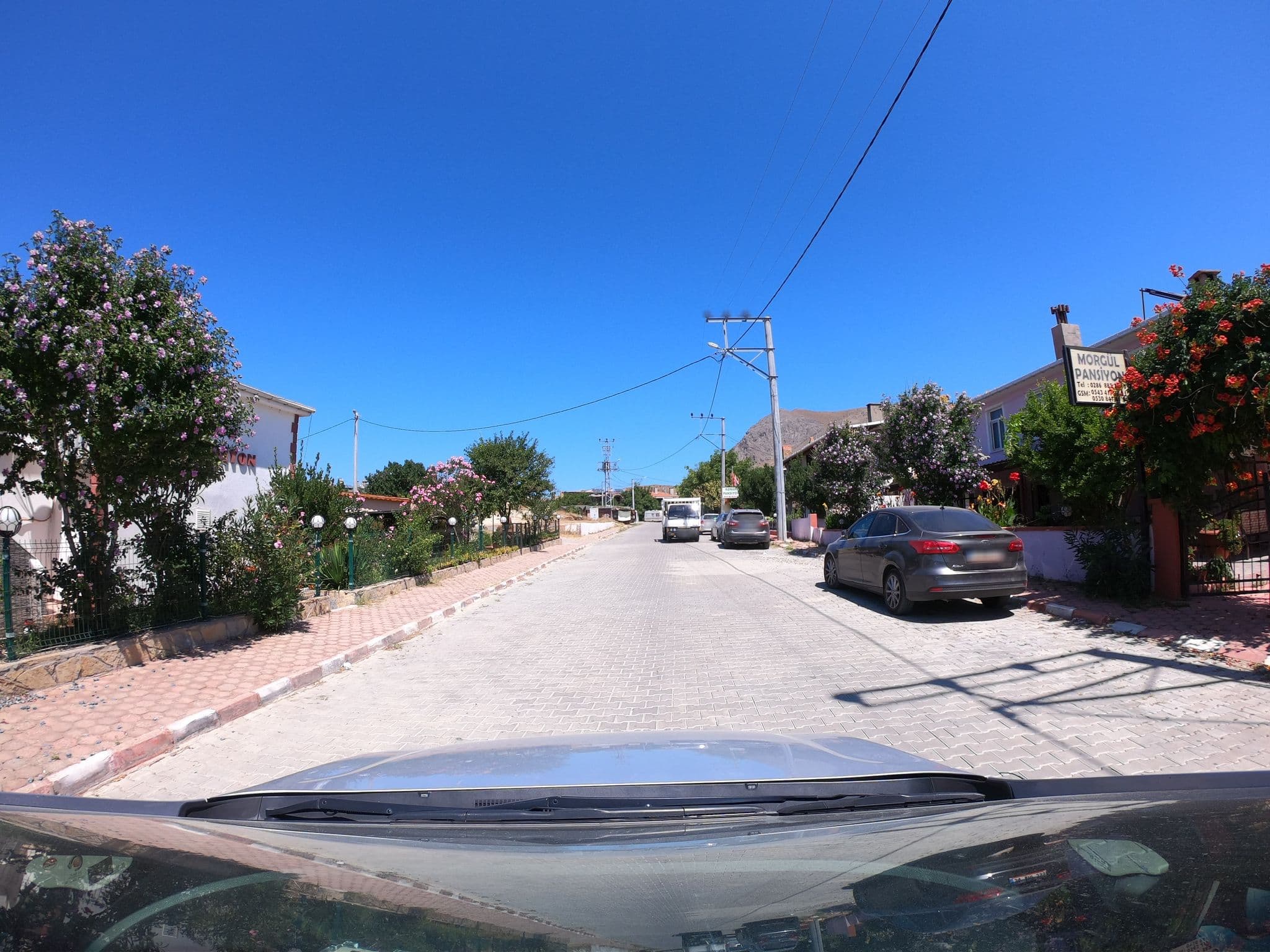 Street view near Olimbera Konukevi, Gökçeada — © asturksever (CC BY-SA · Mapillary)