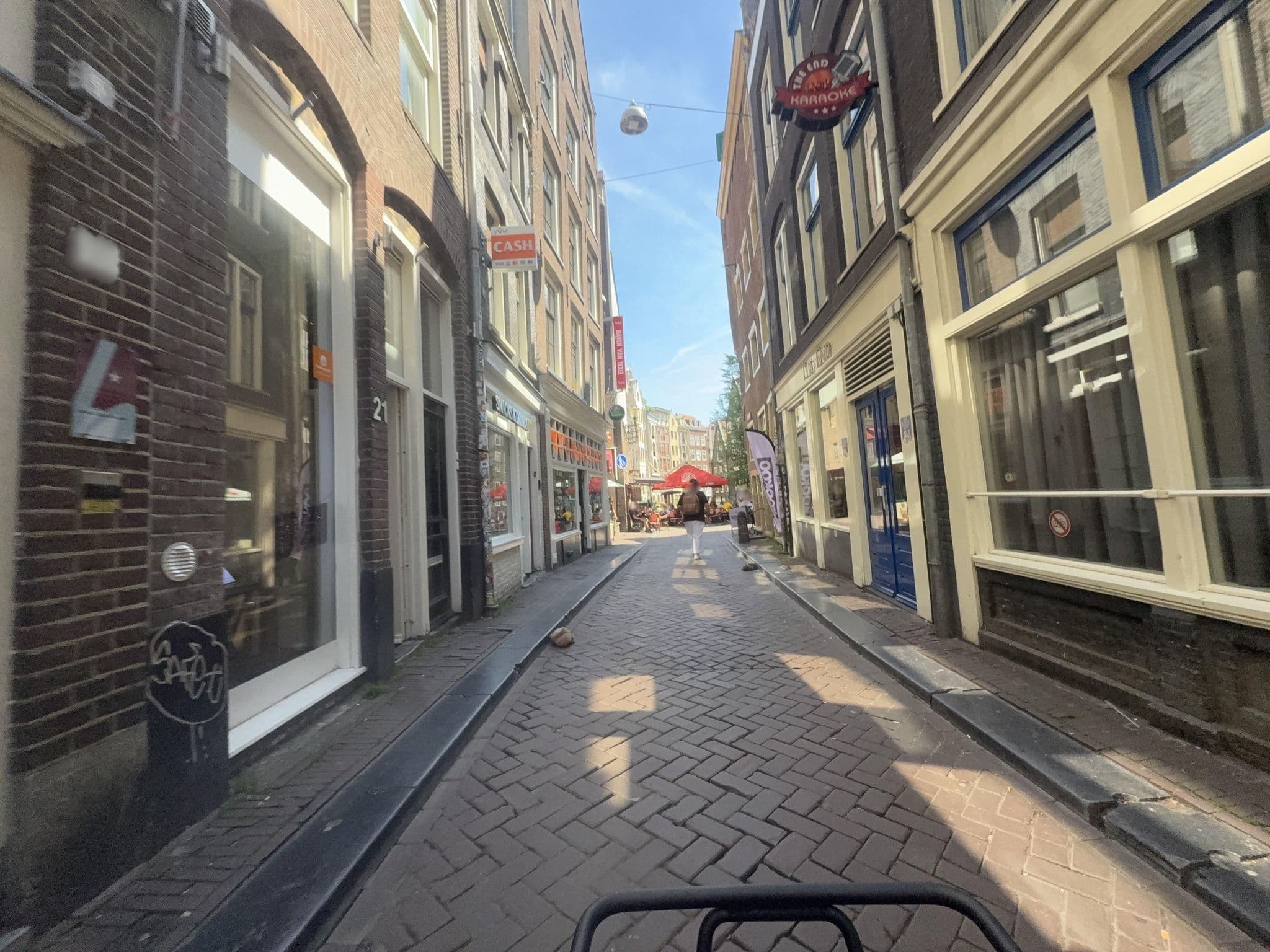Street view near Canal side Olofssteeg, Amsterdam — © ottor (CC BY-SA · Mapillary)