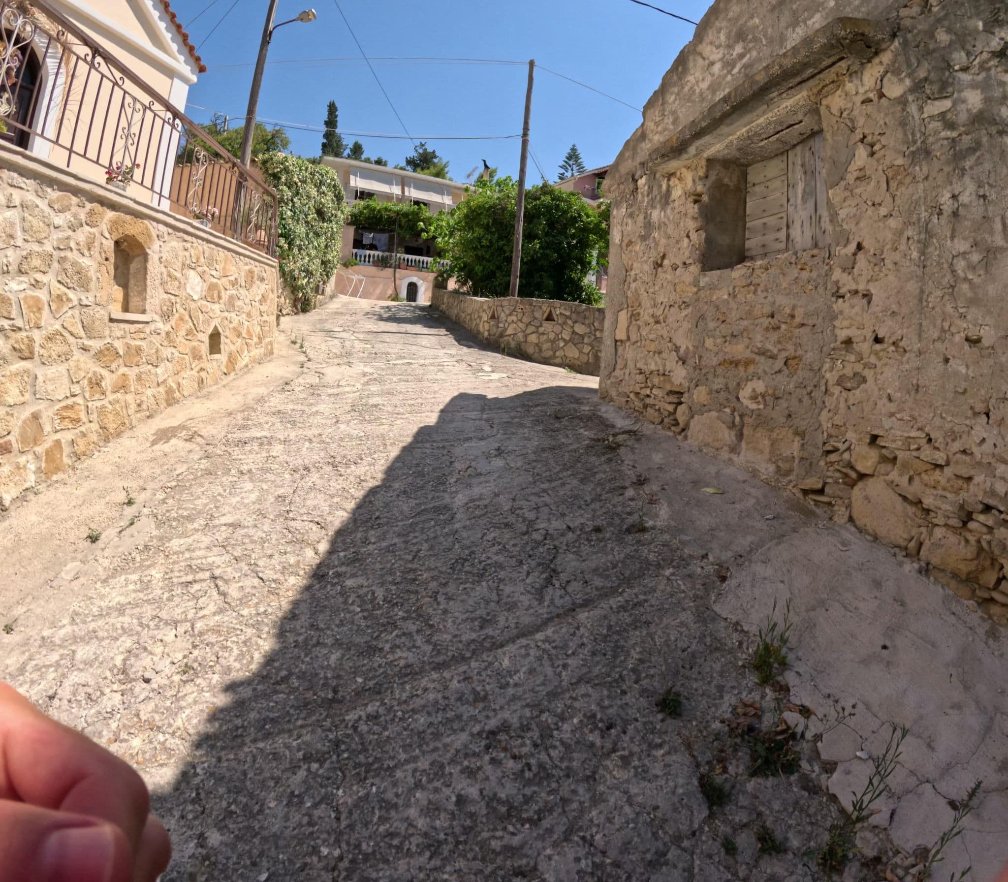 Street view near Photographer's Apartments, Katastárion — © krzyk (CC BY-SA · Mapillary)