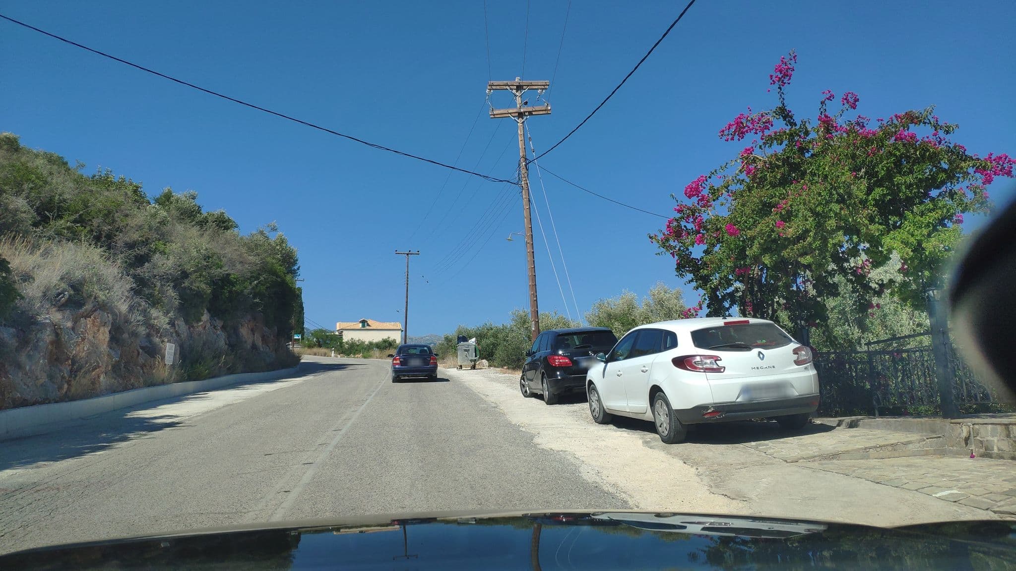 Street view near Sea Sound Rooms & Apartments, Nidhríon — © pppetros (CC BY-SA · Mapillary)