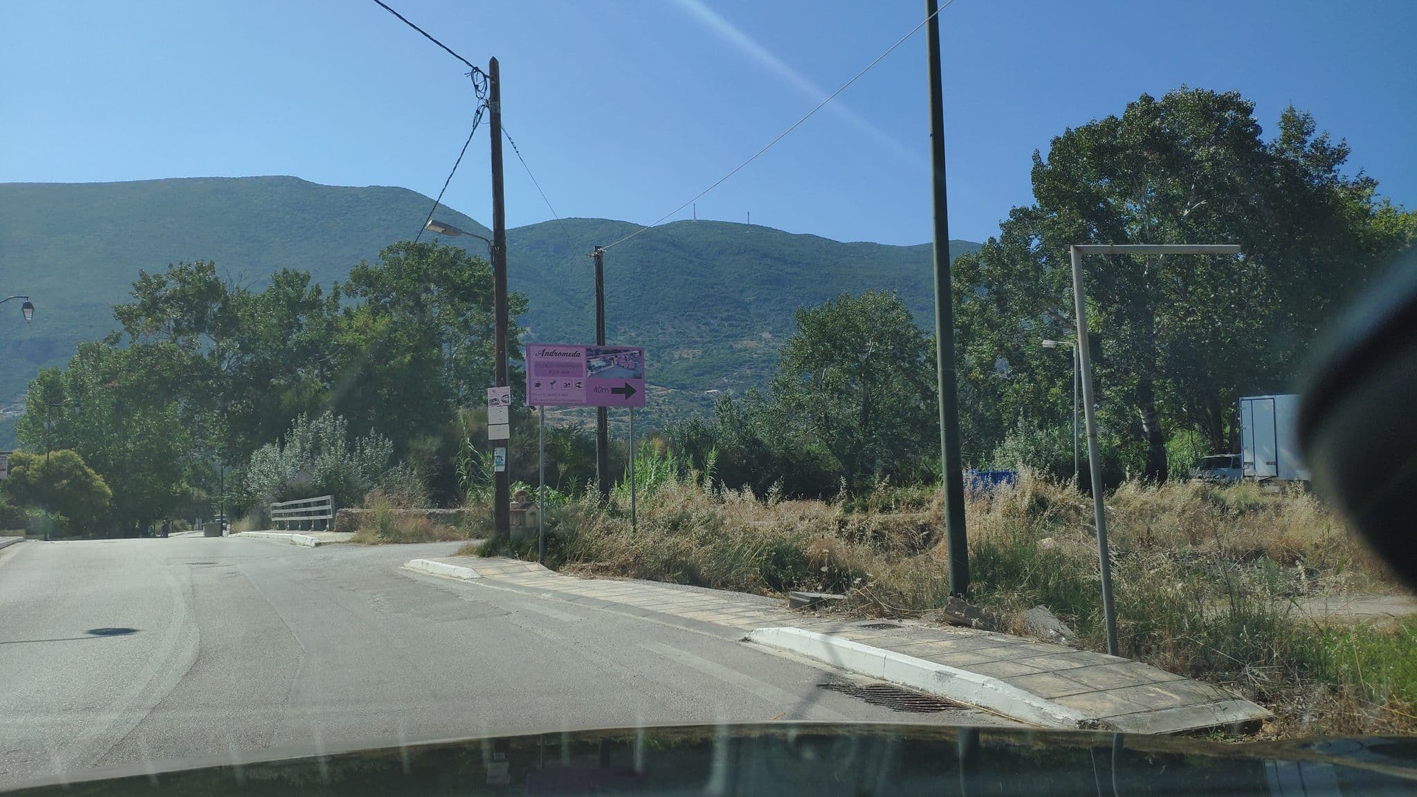 Street view near Heliotropia Houses, Nidhríon — © pppetros (CC BY-SA · Mapillary)