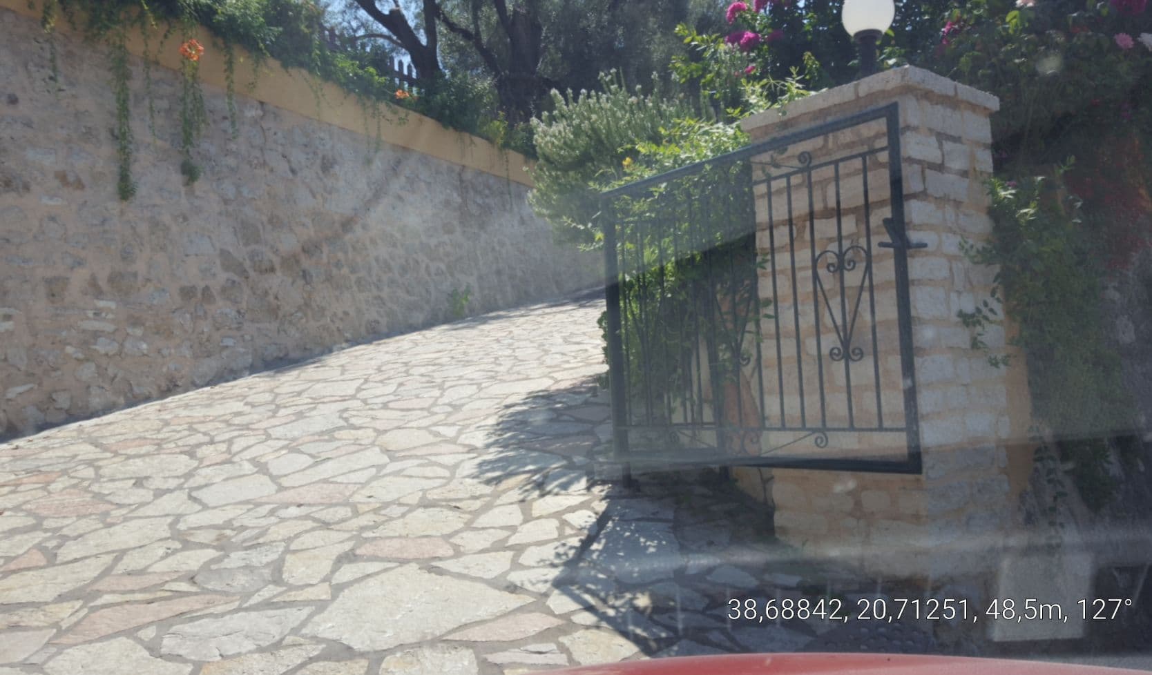 Street view near Helios Club, Nidhríon — © samsam7575 (CC BY-SA · Mapillary)