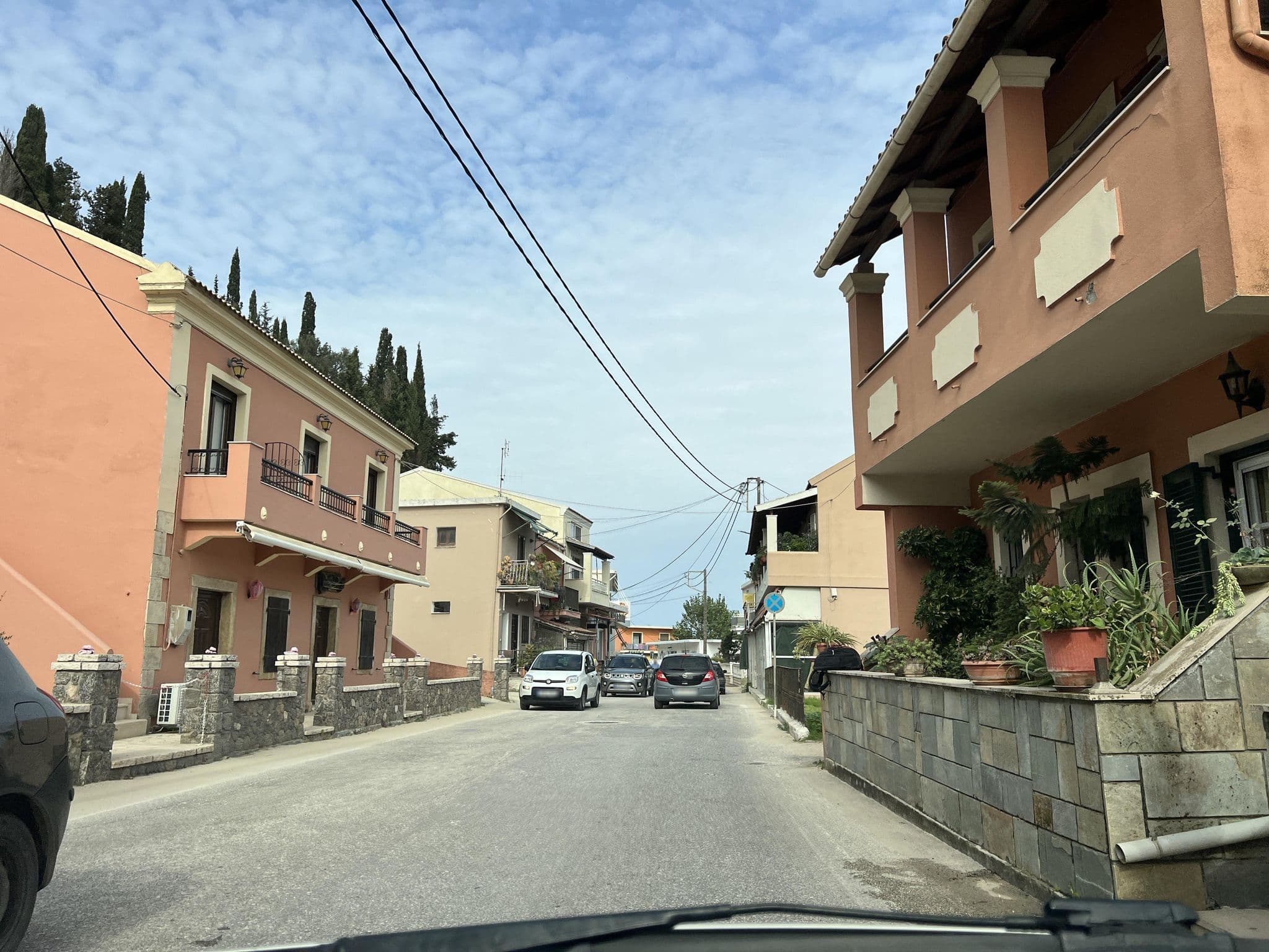 Street view near Legends Hotel & Apartments - Αυλωνιτησ Τουριστικη & Ξενοδοχειακη, Agios Georgis — © VMConsulting (CC BY-SA · Mapillary)