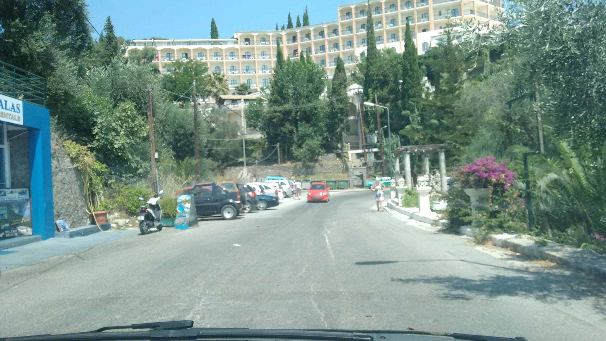 Street view near Taxi Drivers  Apartments, Agios Georgis — © robot8a (CC BY-SA · Mapillary)