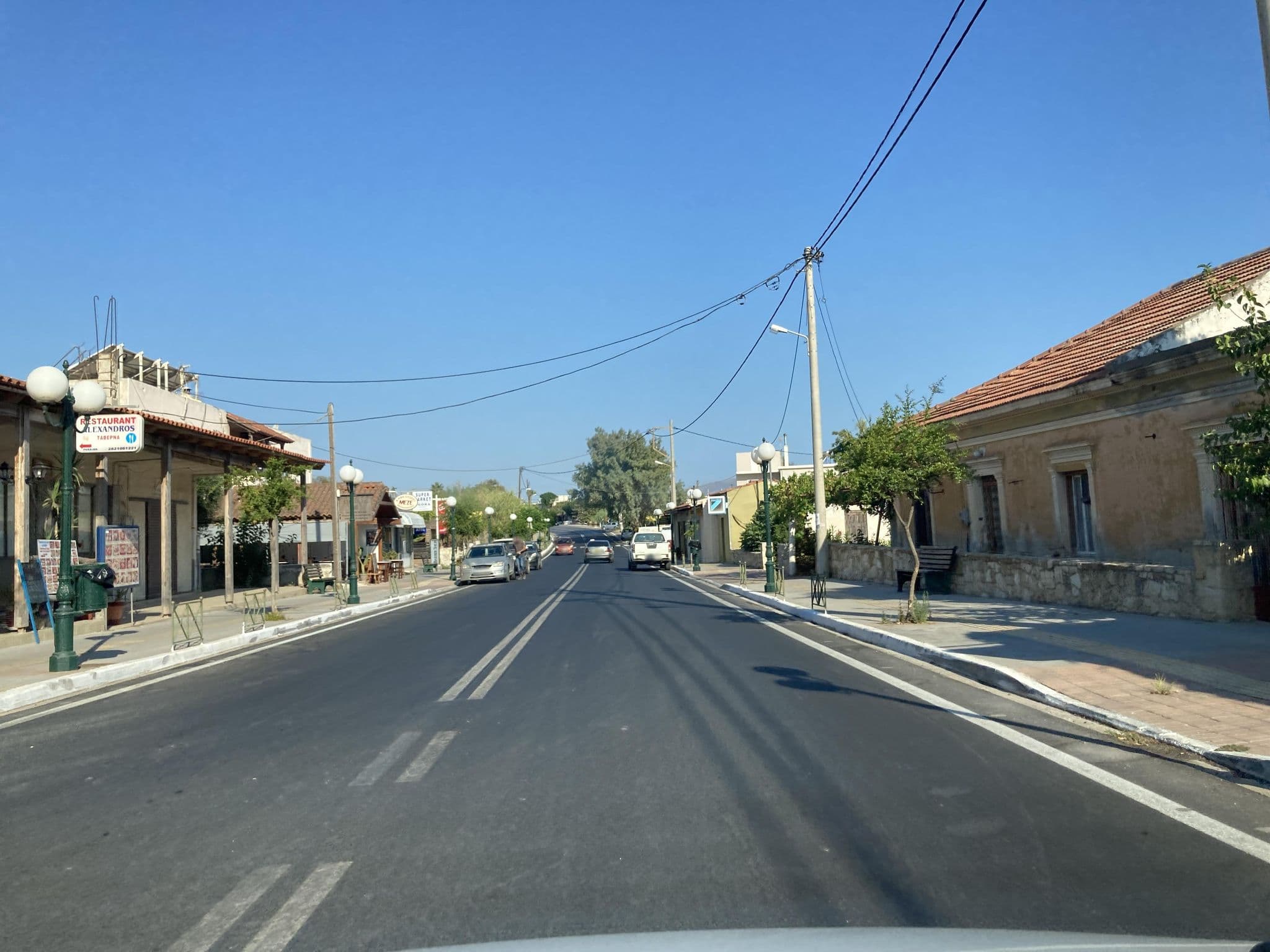 Street view near Anemomilos Studios & Apartments, Galatás — © fod (CC BY-SA · Mapillary)