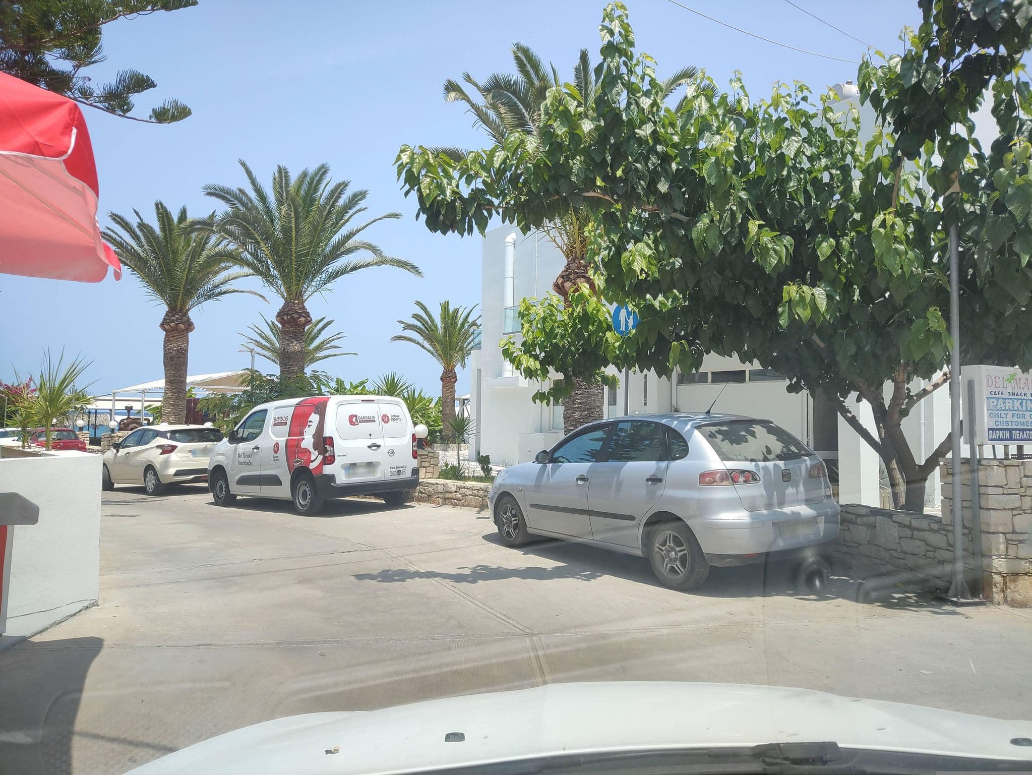 Street view near Nostos Beach Boutique Hotel, Zonianá — © stefan4614 (CC BY-SA · Mapillary)