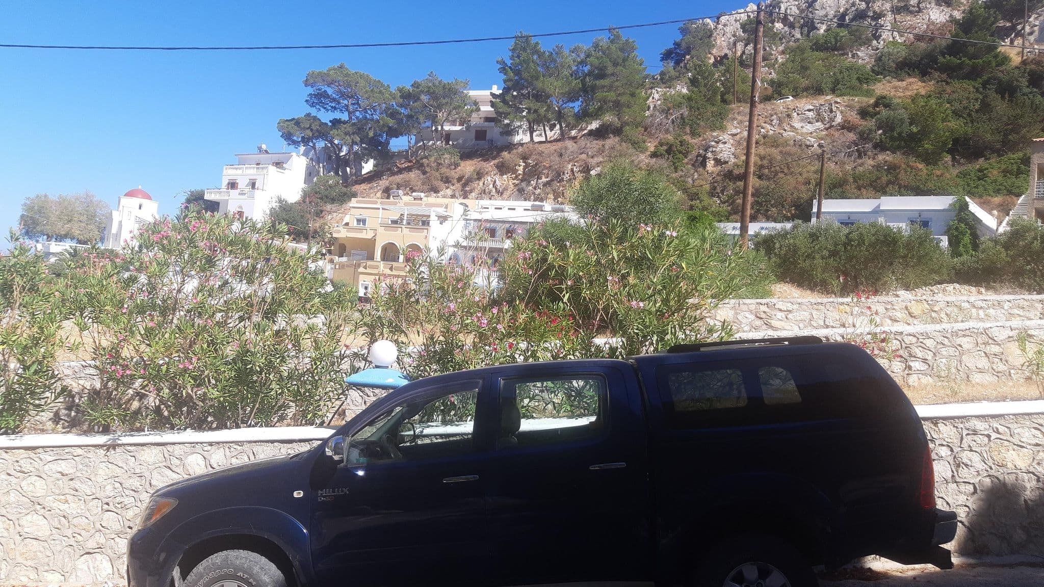 Street view near Blue Waves Studios, Karpathos — © Ewcia (CC BY-SA · Mapillary)