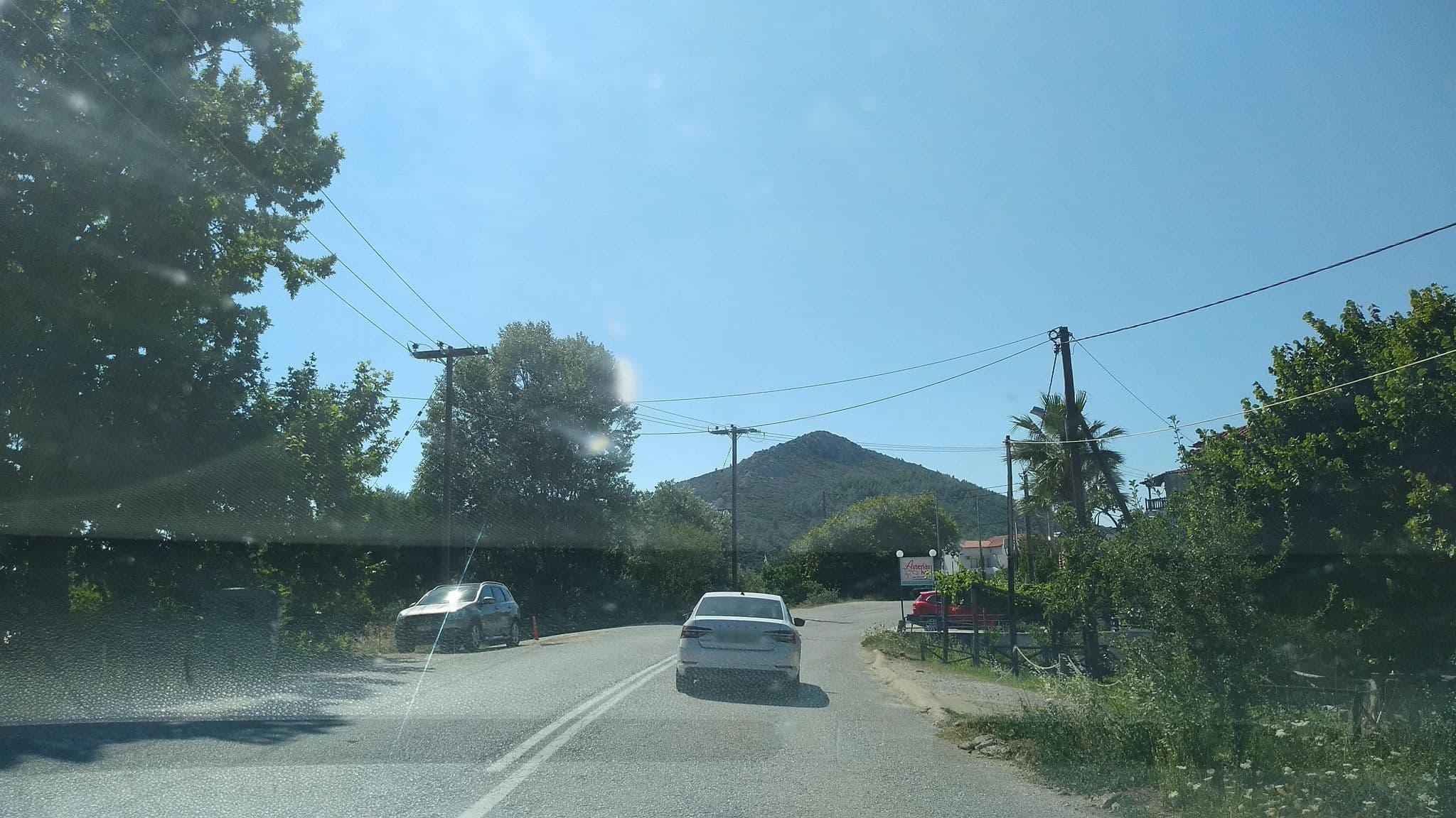 Street view near Porto Koufo Limin Appartments, Sykiá — © tavi (CC BY-SA · Mapillary)
