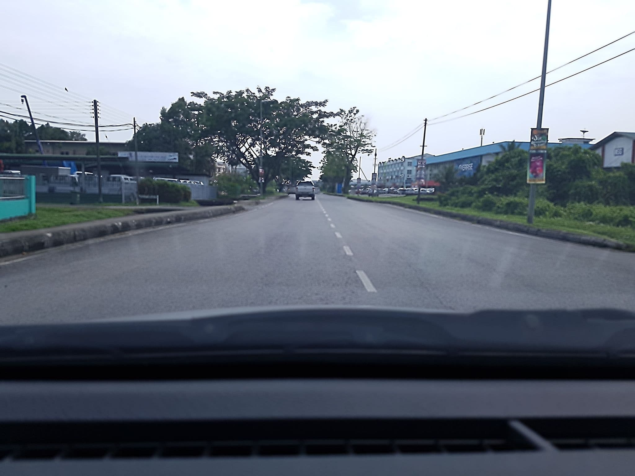 Street view near Beacon Kuching, Kuching — © evelyn_kong (CC BY-SA · Mapillary)