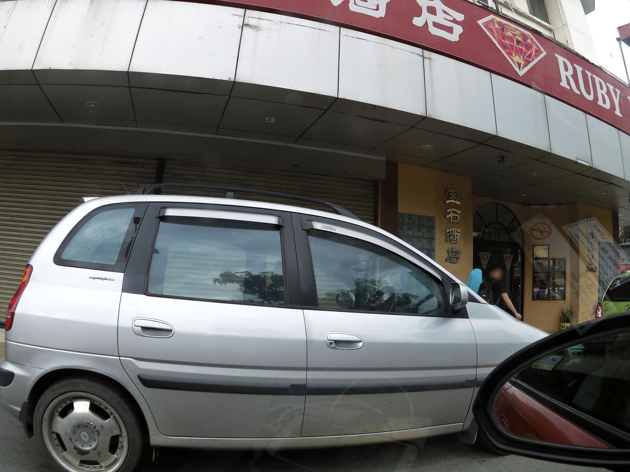 Street view near Rafflesia Hotel, Kota Kinabalu — © skillsy (CC BY-SA · Mapillary)