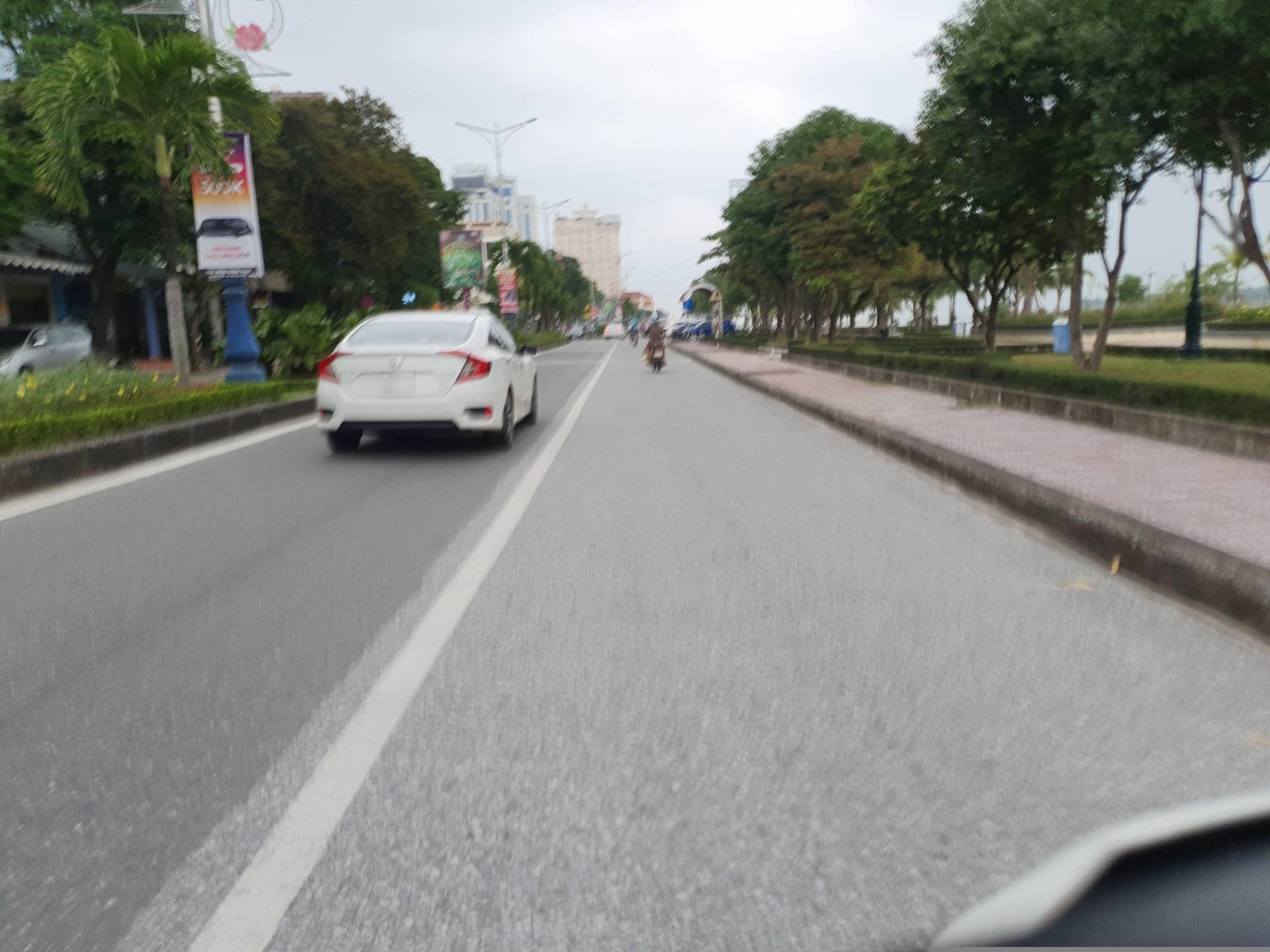 Street view near Dolphin Home, Đồng Hới — © russmcd (CC BY-SA · Mapillary)