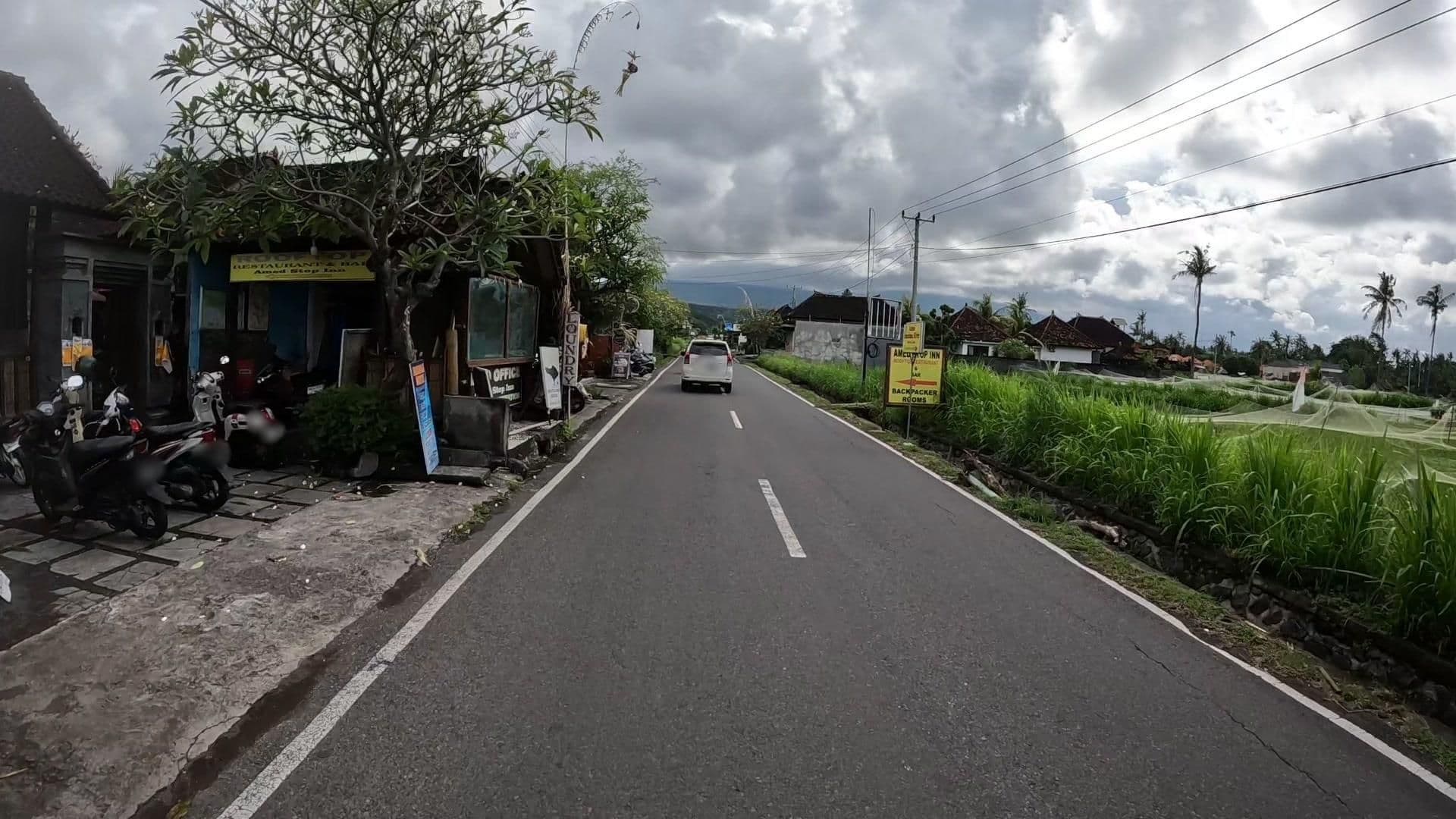 Street view near Amed Stop Inn, Amlapura — © lucomsky (CC BY-SA · Mapillary)