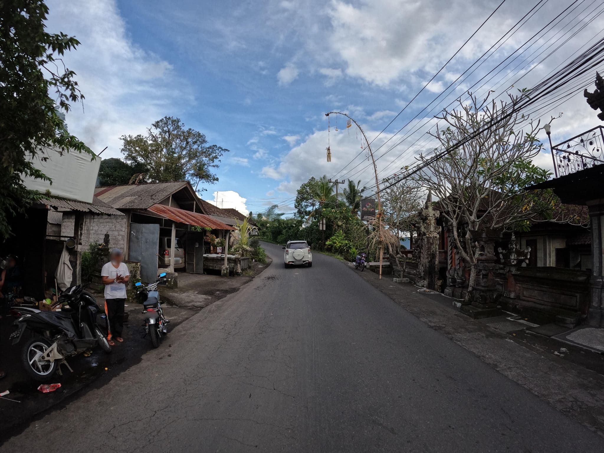 Street view near KUPU-KUPU (traditional weaving songket), Banjar Wangsian — © lucomsky (CC BY-SA · Mapillary)