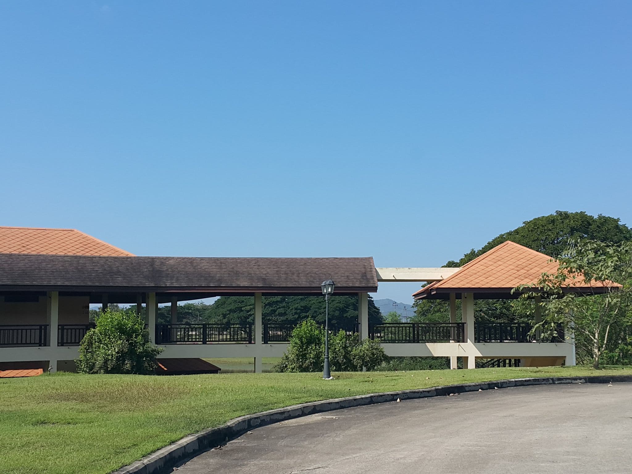 Street view near บ้านชัยพฤกษ์ @ กฟผ. แม่เมาะ, Lampang — © jrcarlsen (CC BY-SA · Mapillary)